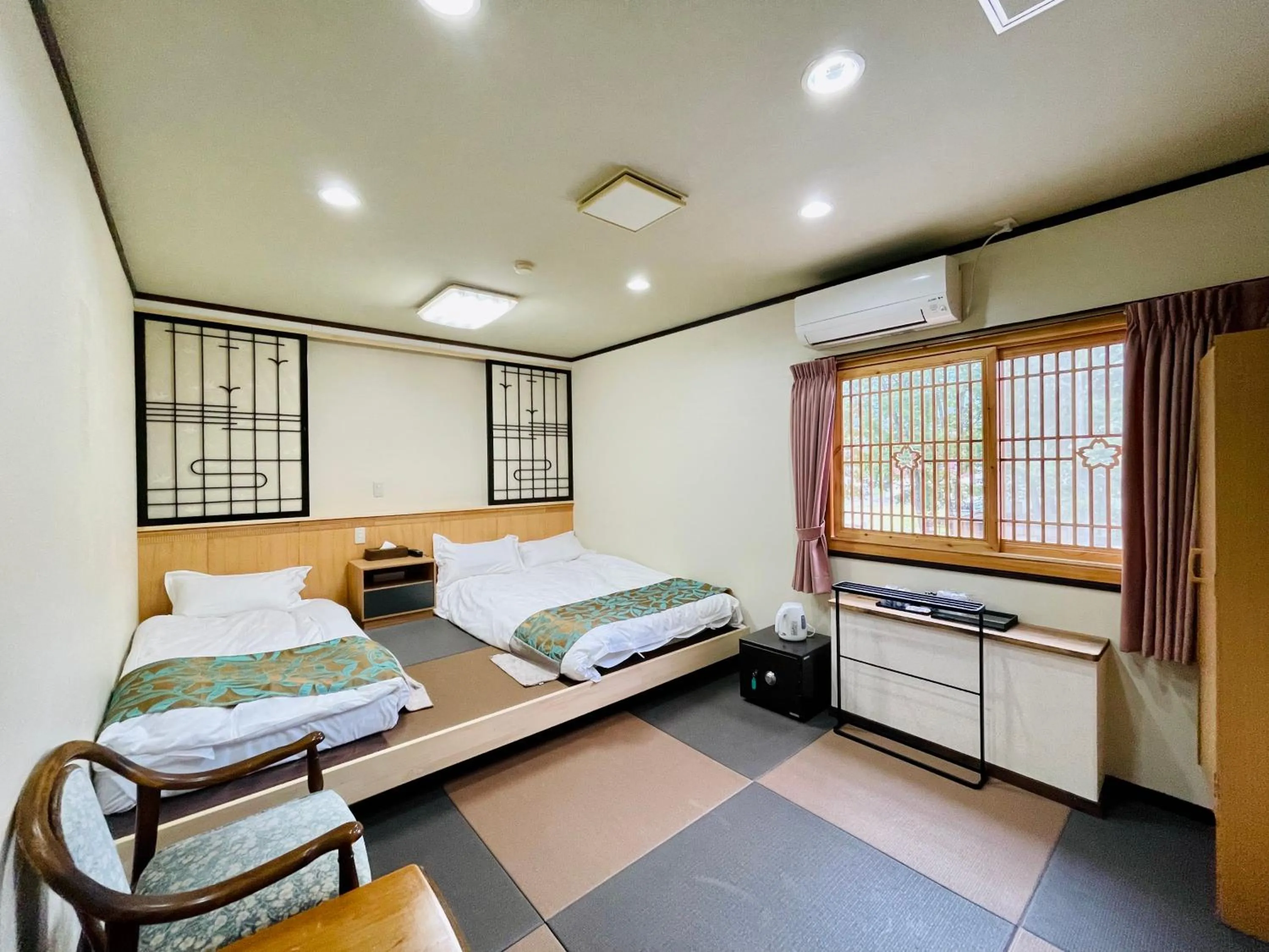Photo of the whole room, Bed in Kurobe Sunvalley Hotel