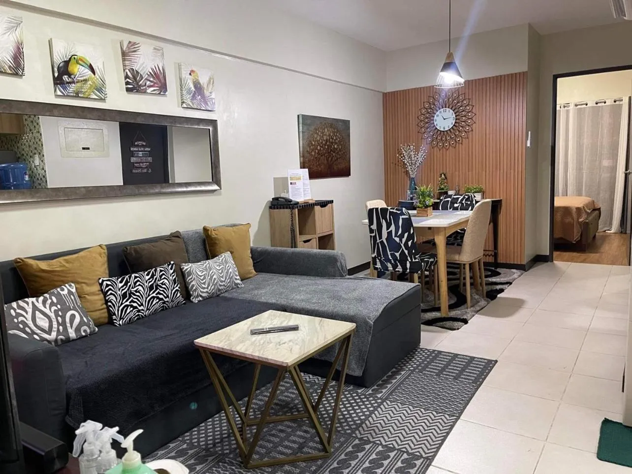 Living room in MaRoy Suites at Asteria Residences (Near NAIA with free Parking+Fiber Internet)