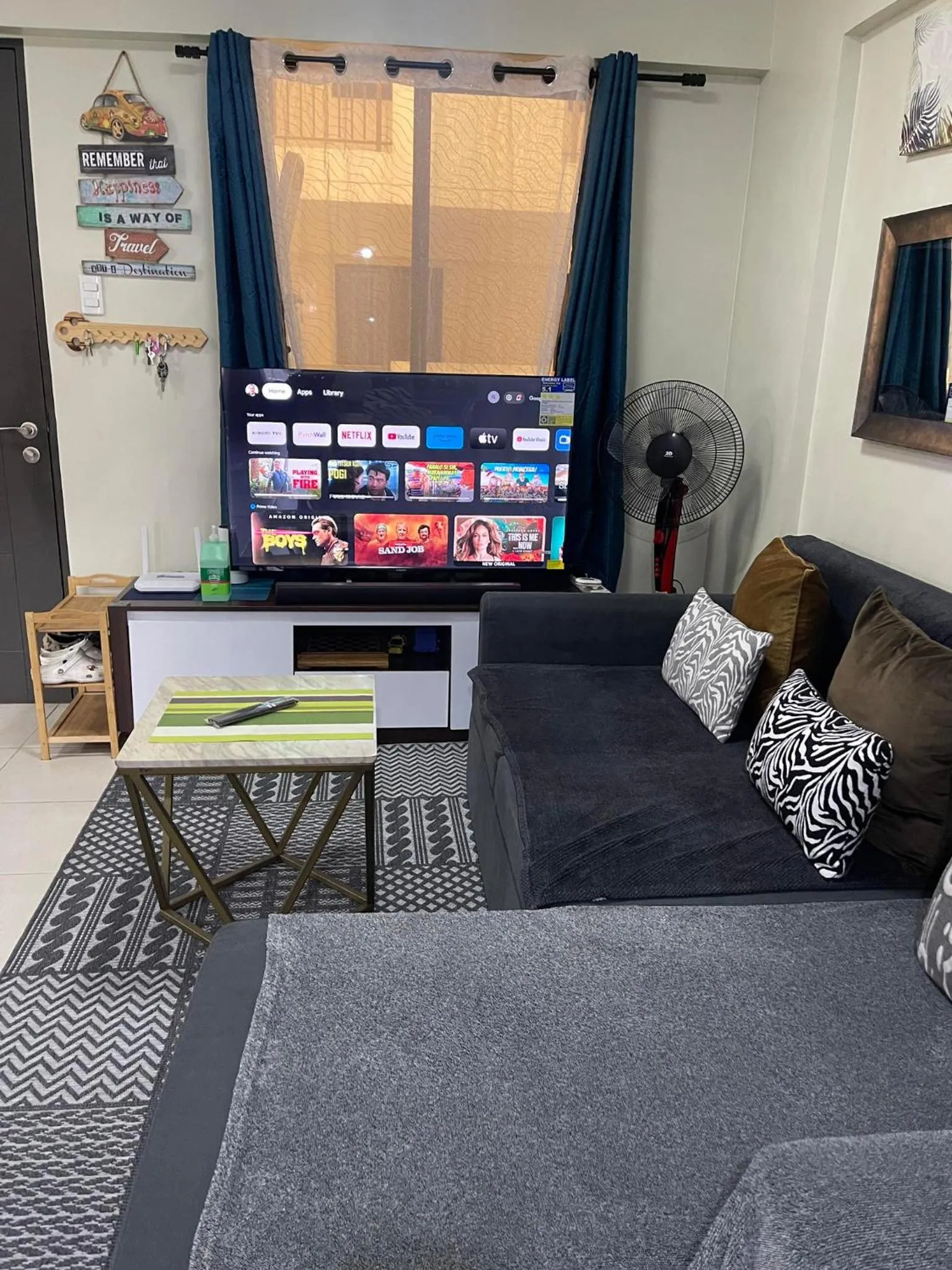 Living room in MaRoy Suites at Asteria Residences (Near NAIA with free Parking+Fiber Internet)