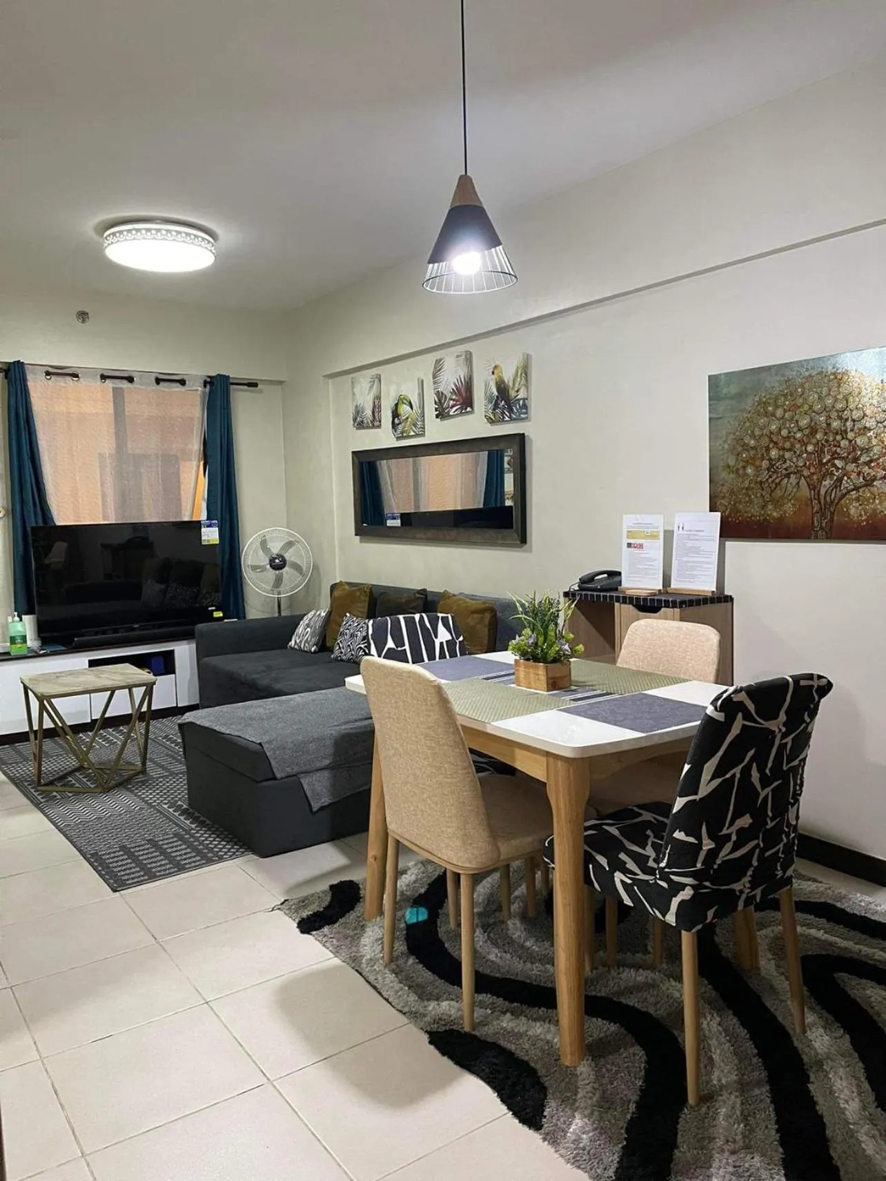 Living room in MaRoy Suites at Asteria Residences (Near NAIA with free Parking+Fiber Internet)