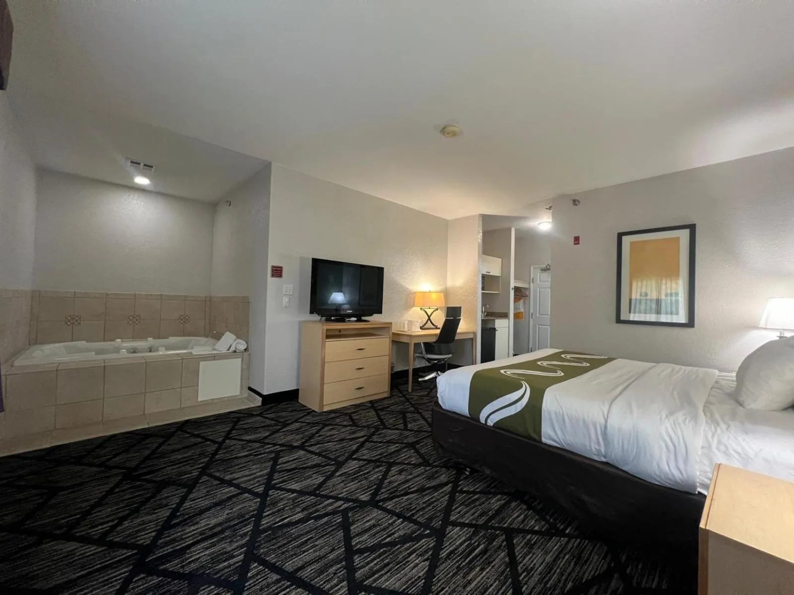 Bed in Quality Inn & Suites Loveland