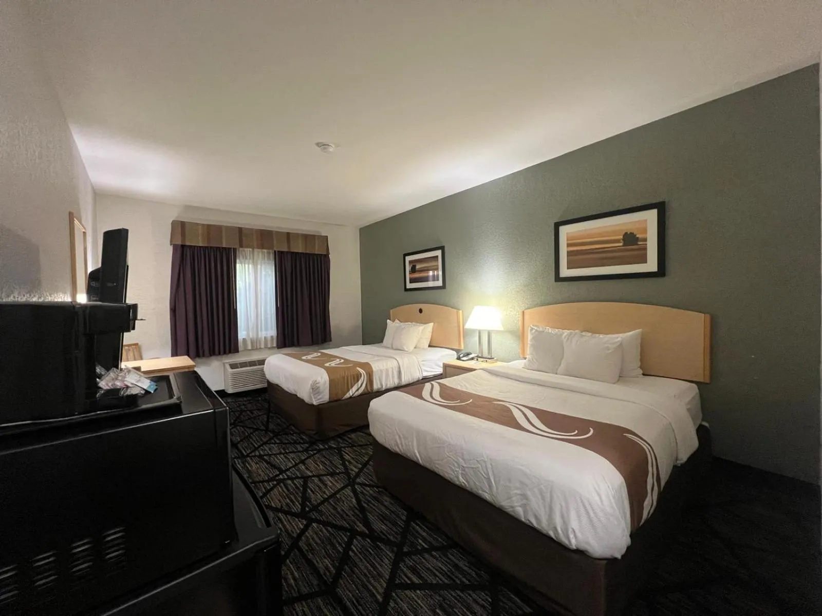 Bed in Quality Inn & Suites Loveland