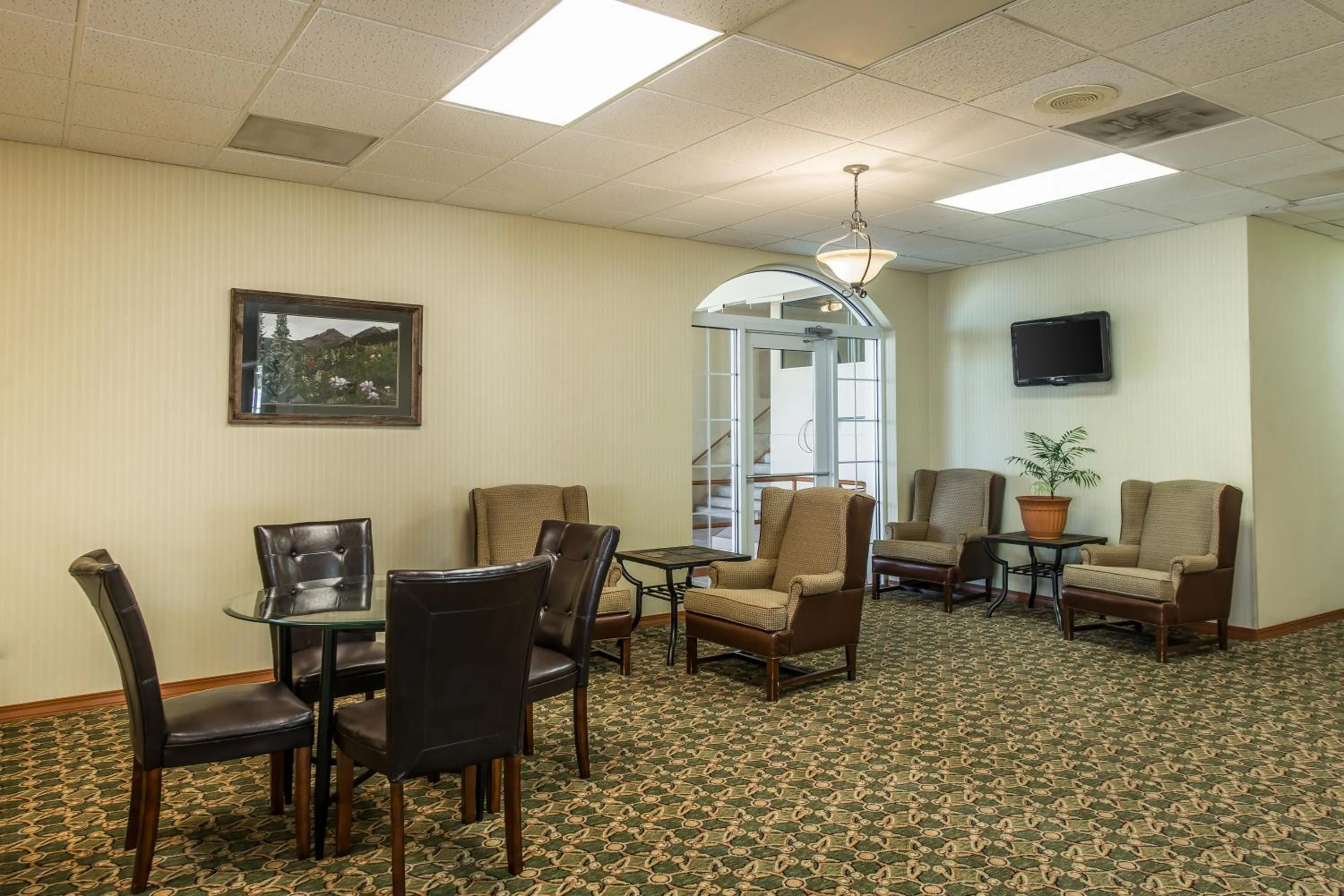 Communal lounge/ TV room in Baymont by Wyndham Fort Morgan