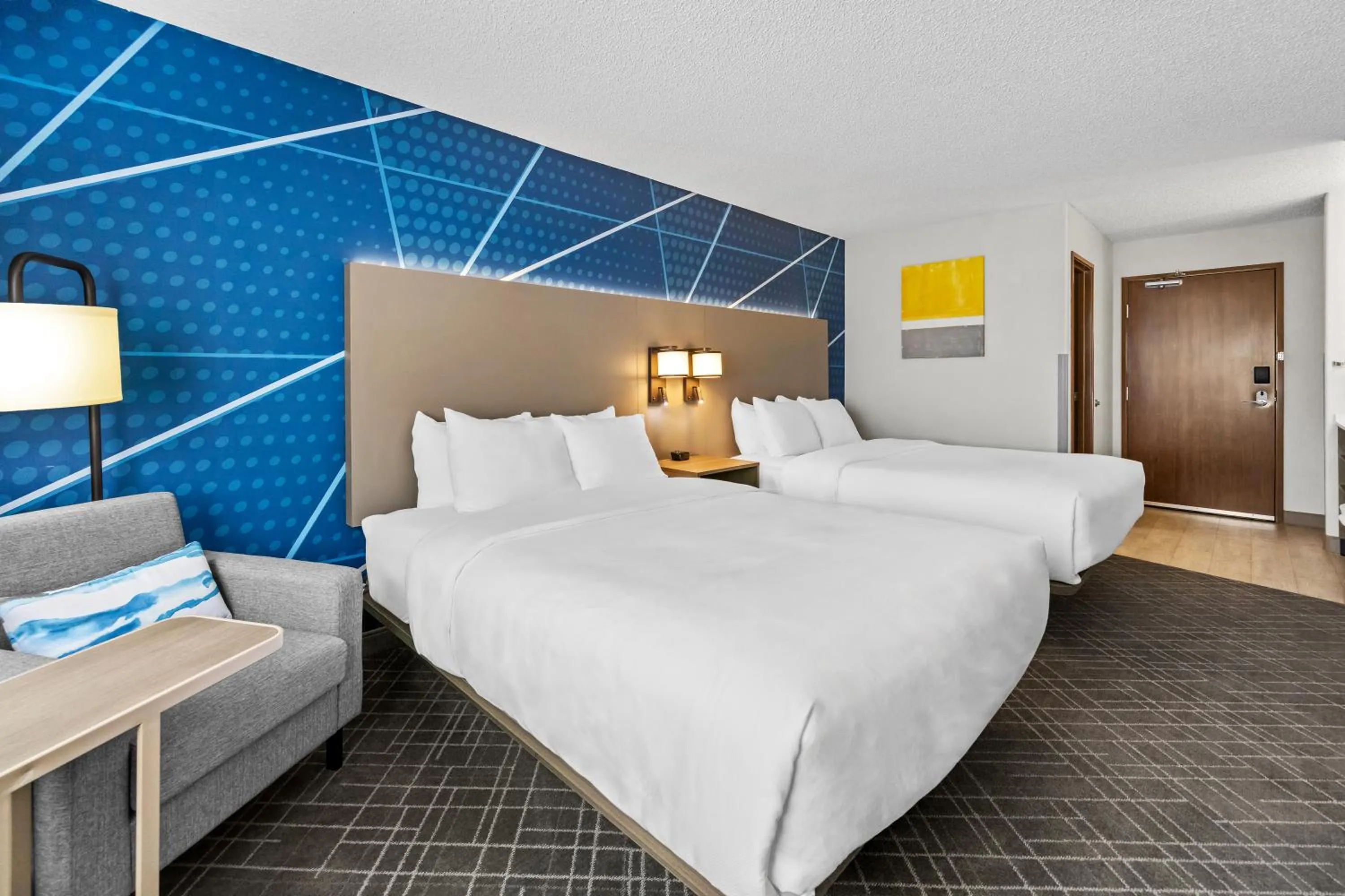 Seating area, Bed in Comfort Inn Grand Junction I-70