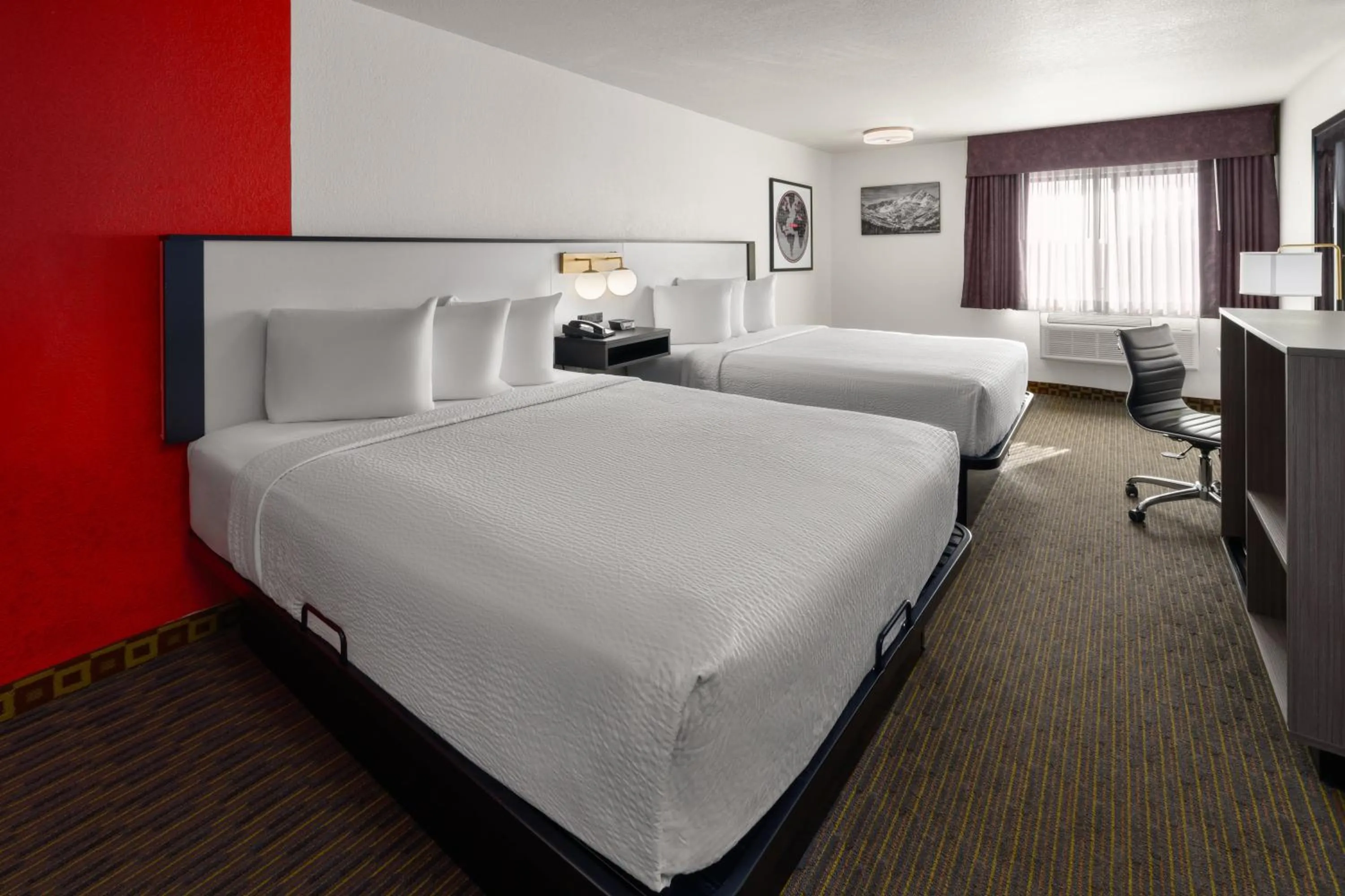 Bed in SYLO Hotel Denver Airport, a Ramada by Wyndham