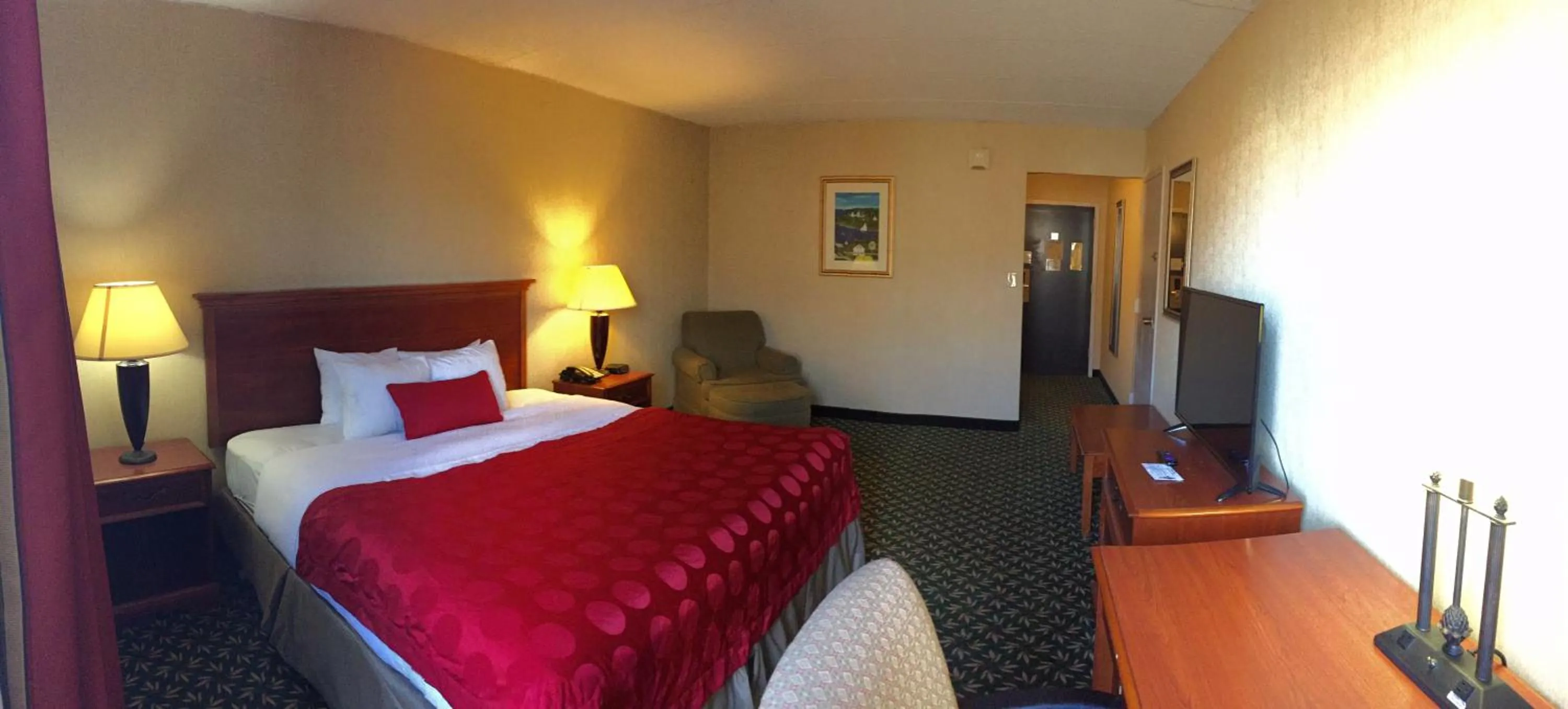 Bed in Mystic River Hotel & Suites