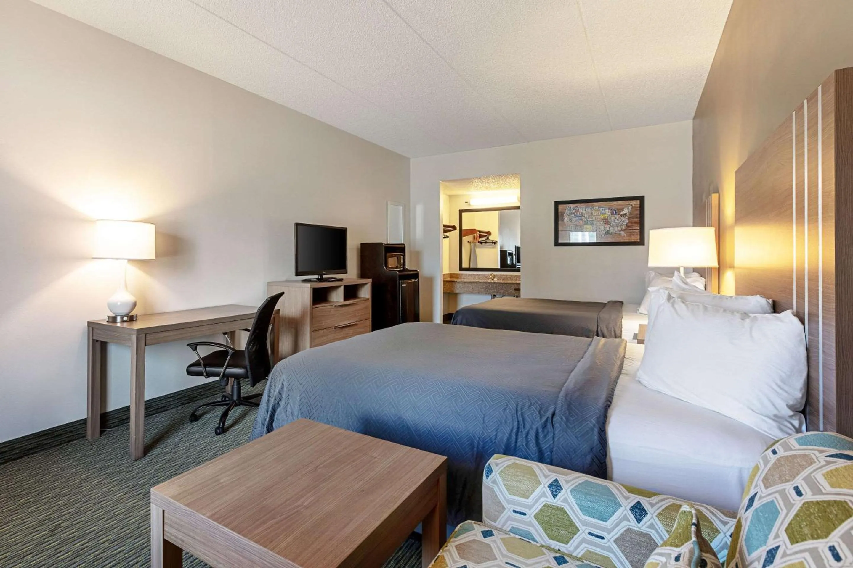 Photo of the whole room, Bed in Econo Lodge Vero Beach - Downtown