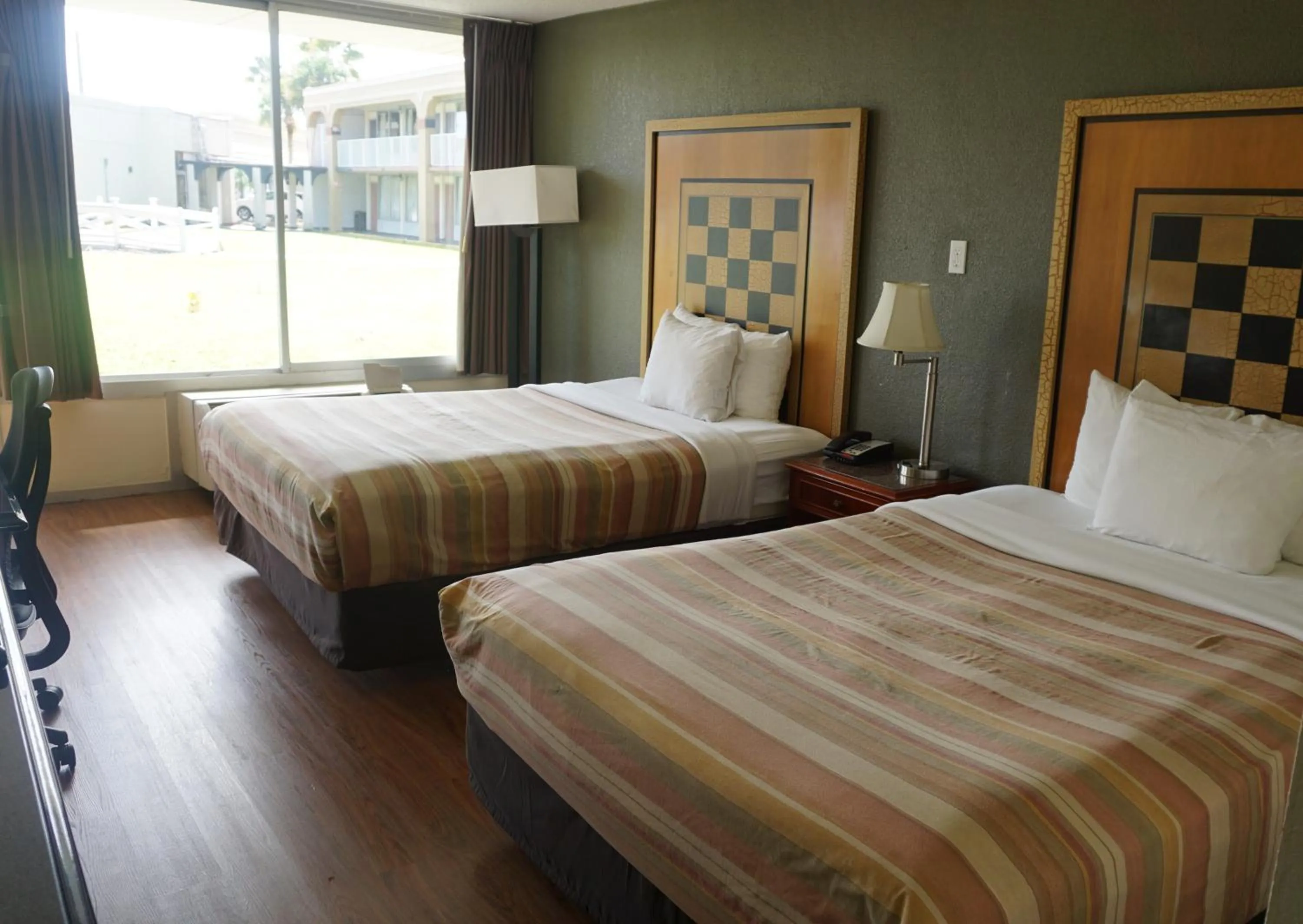 Bed in ISLAND HOTEL of Space Coast