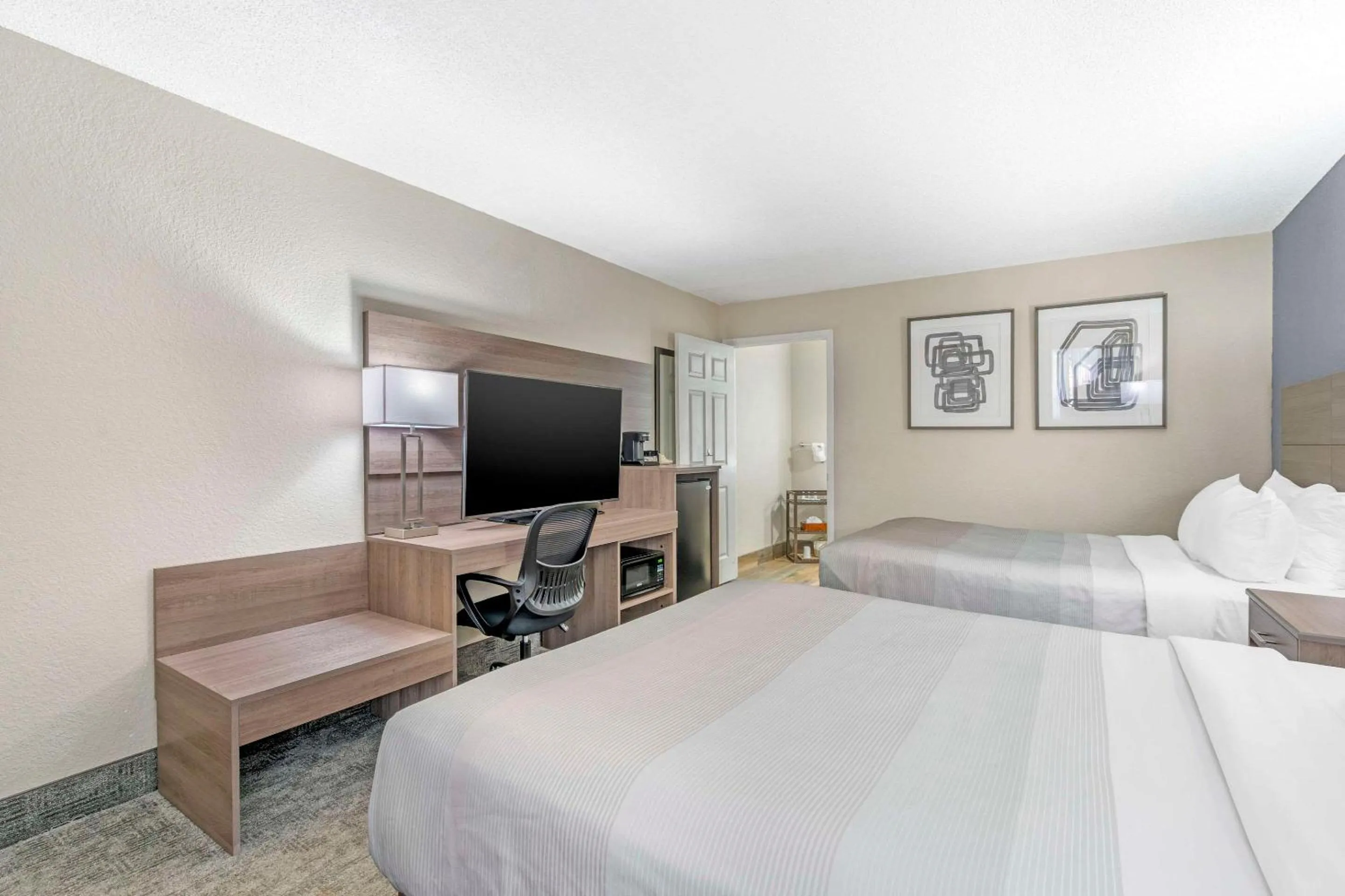 Bedroom, Bed in Quality Inn Daytona Speedway - I-95