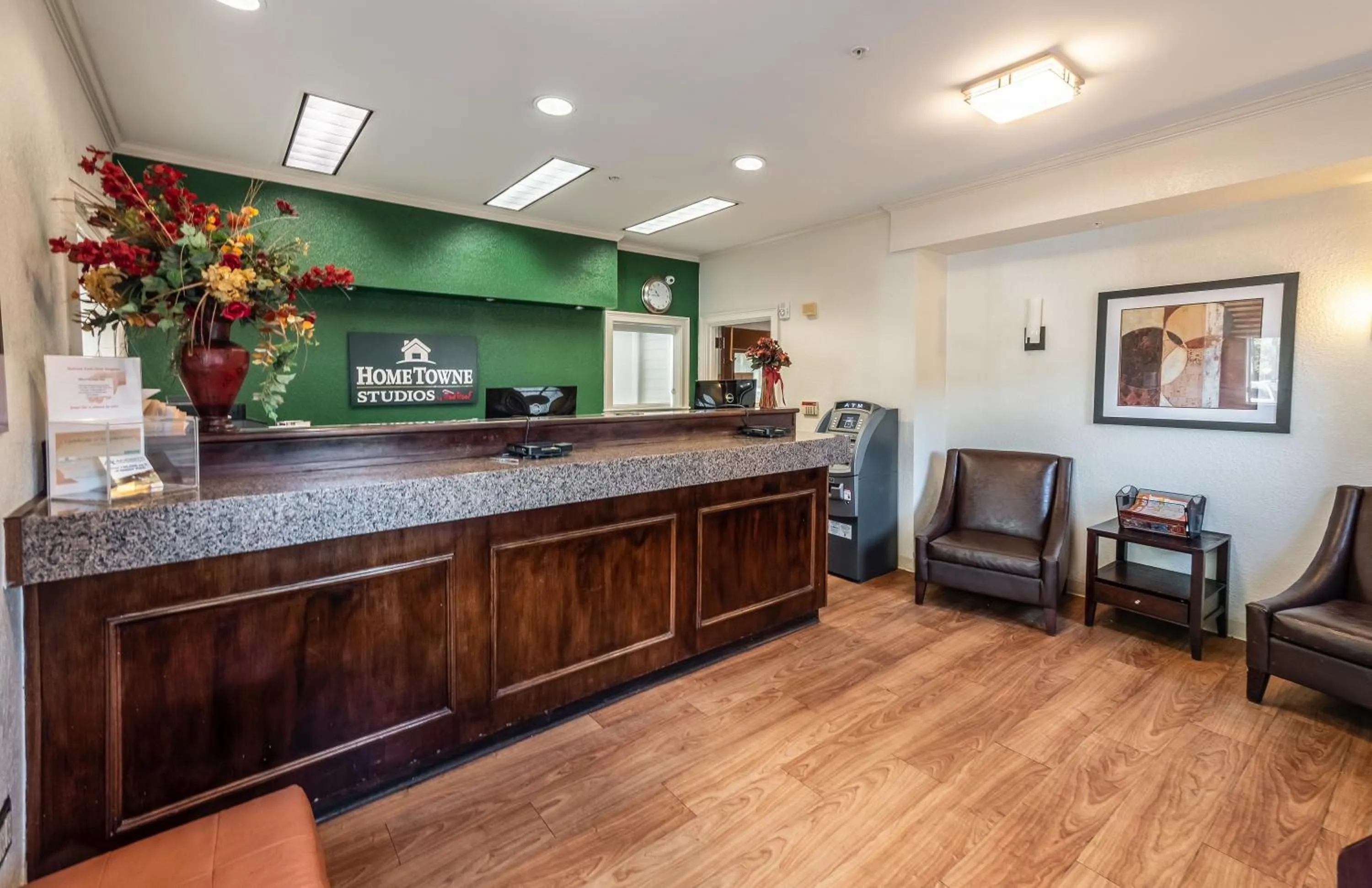 Lobby or reception in HomeTowne Studios by Red Roof Orlando South