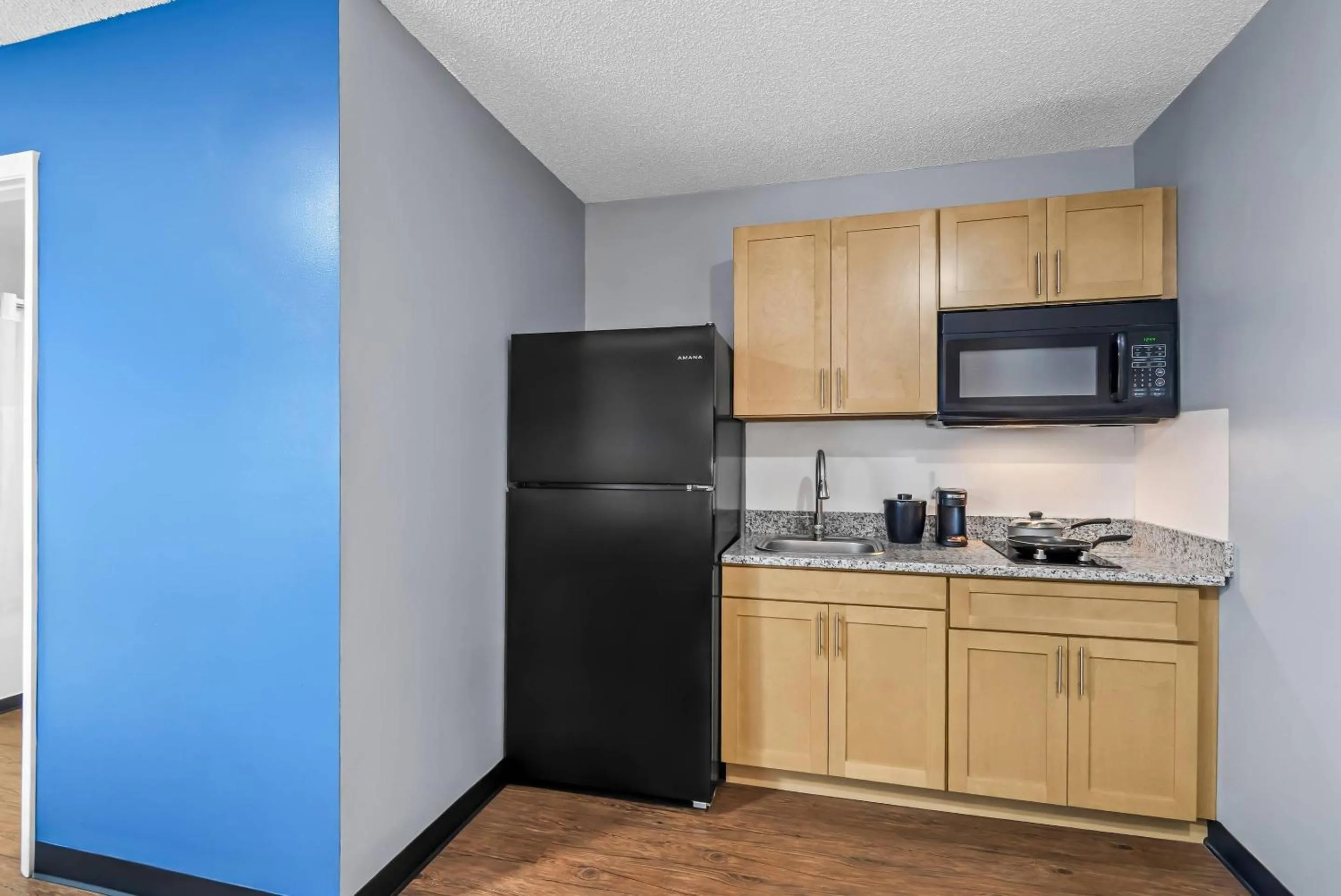 Bedroom in Suburban Studios Stuart near Federal Hwy 1