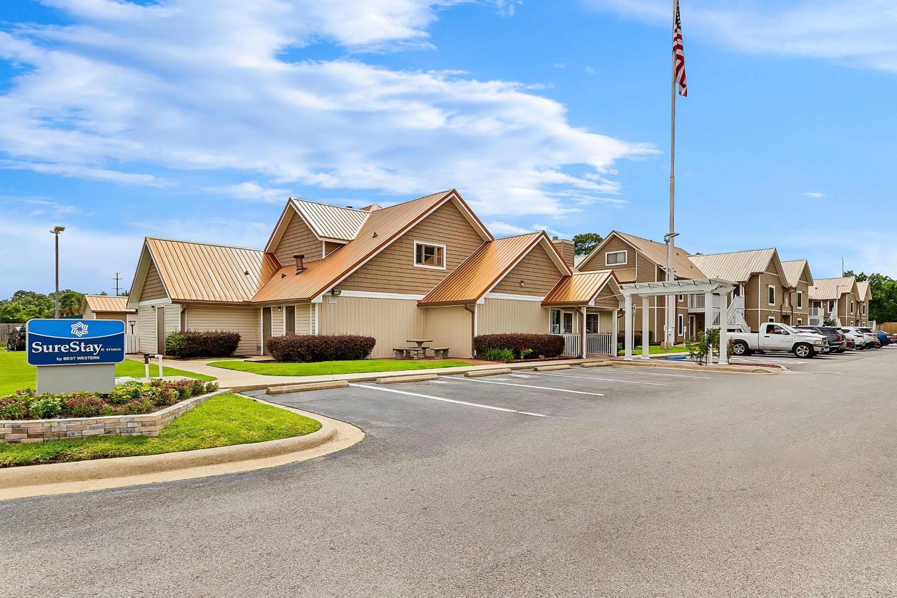 Property building in SureStay Studio by Best Western Pensacola