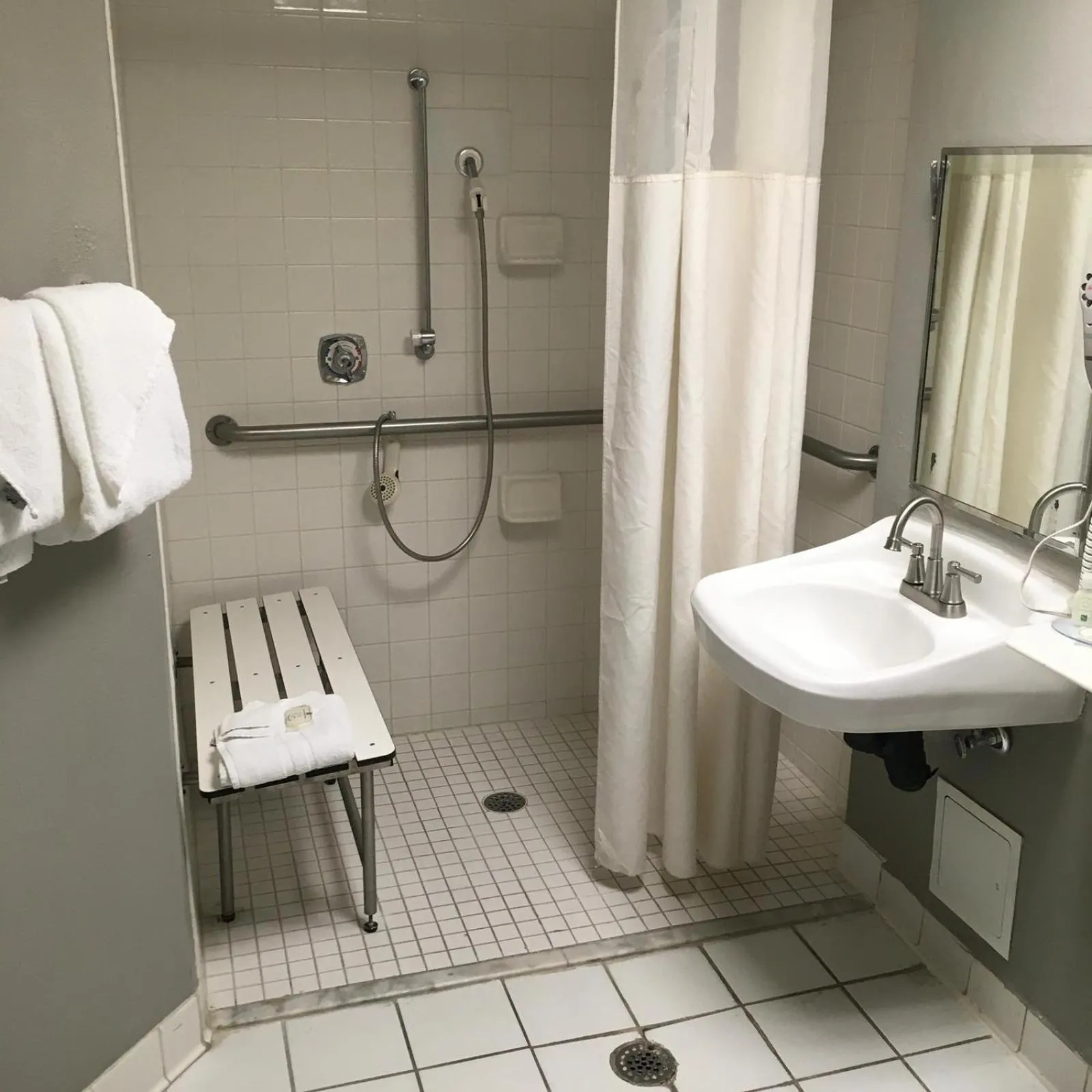Shower in Quality Inn & Suites Winter Park Village Area