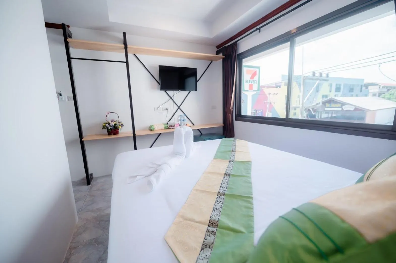 Bed in Coconut Grove Hotel Samui