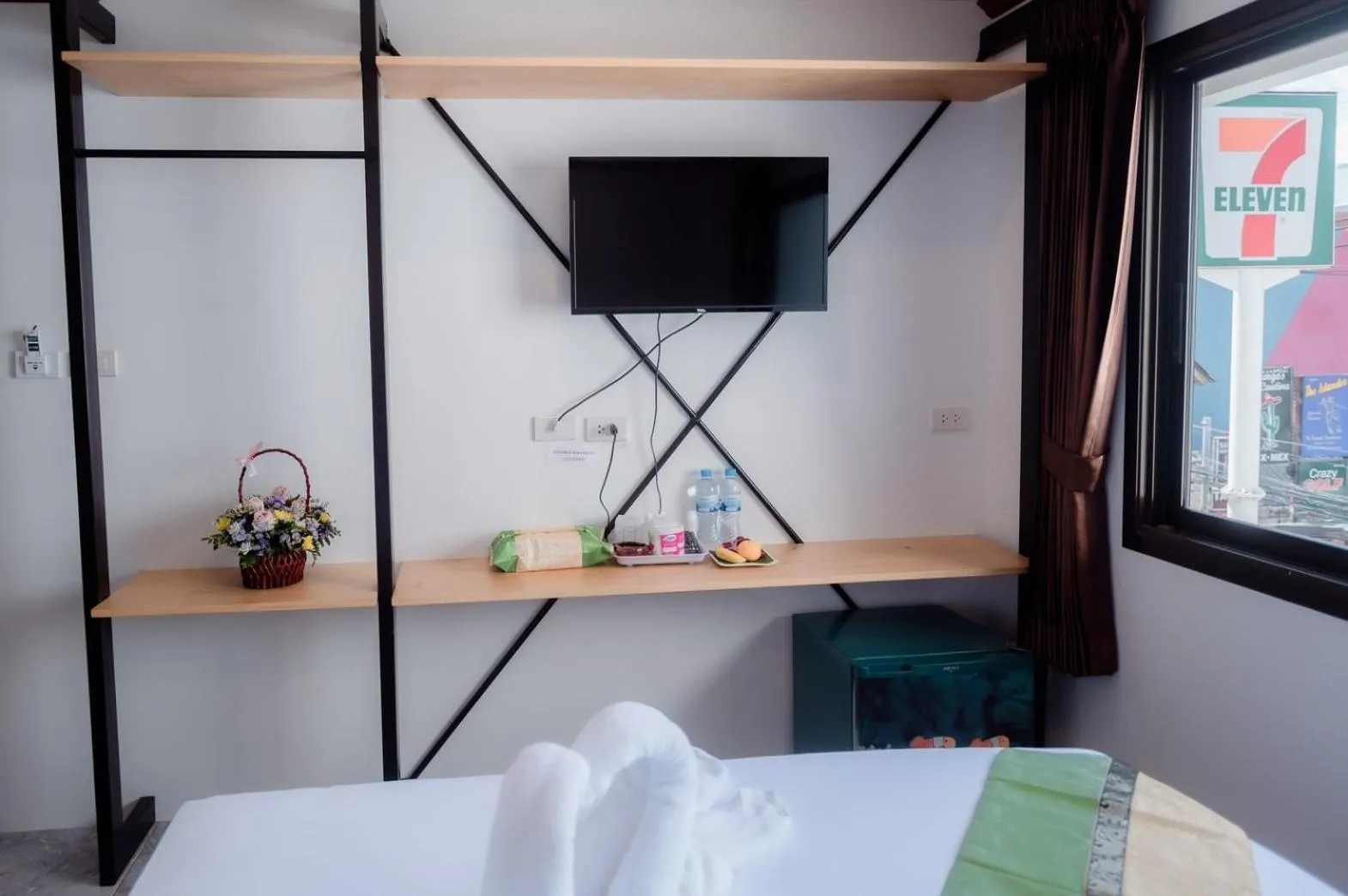 Bed in Coconut Grove Hotel Samui