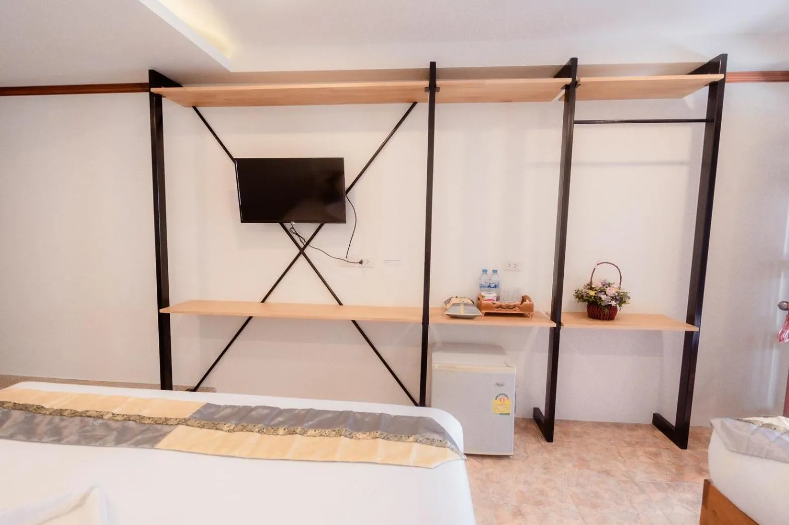 Bed in Coconut Grove Hotel Samui