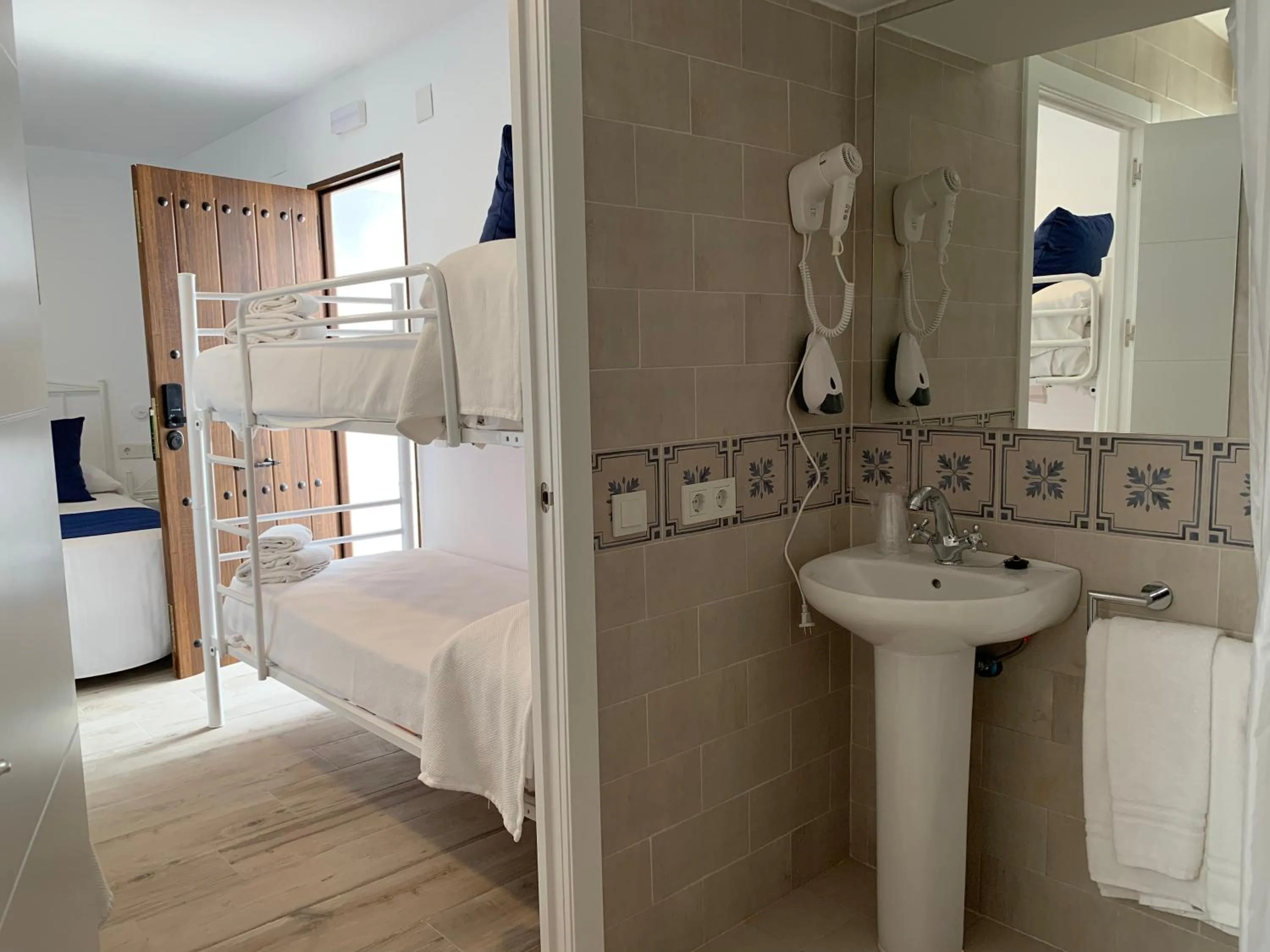 Decorative detail, Bed in Belmonte Rooms