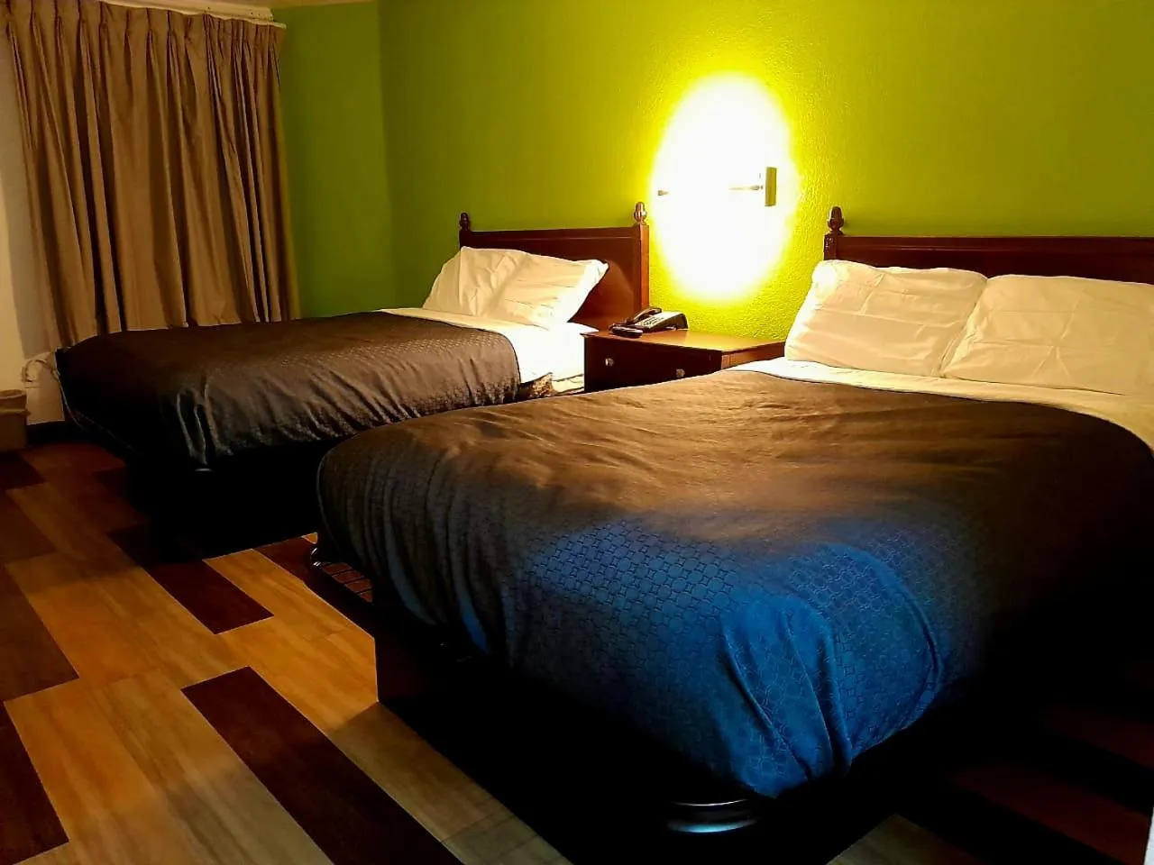 Bed in Budgetel Inn and Suites- FORT GORDON
