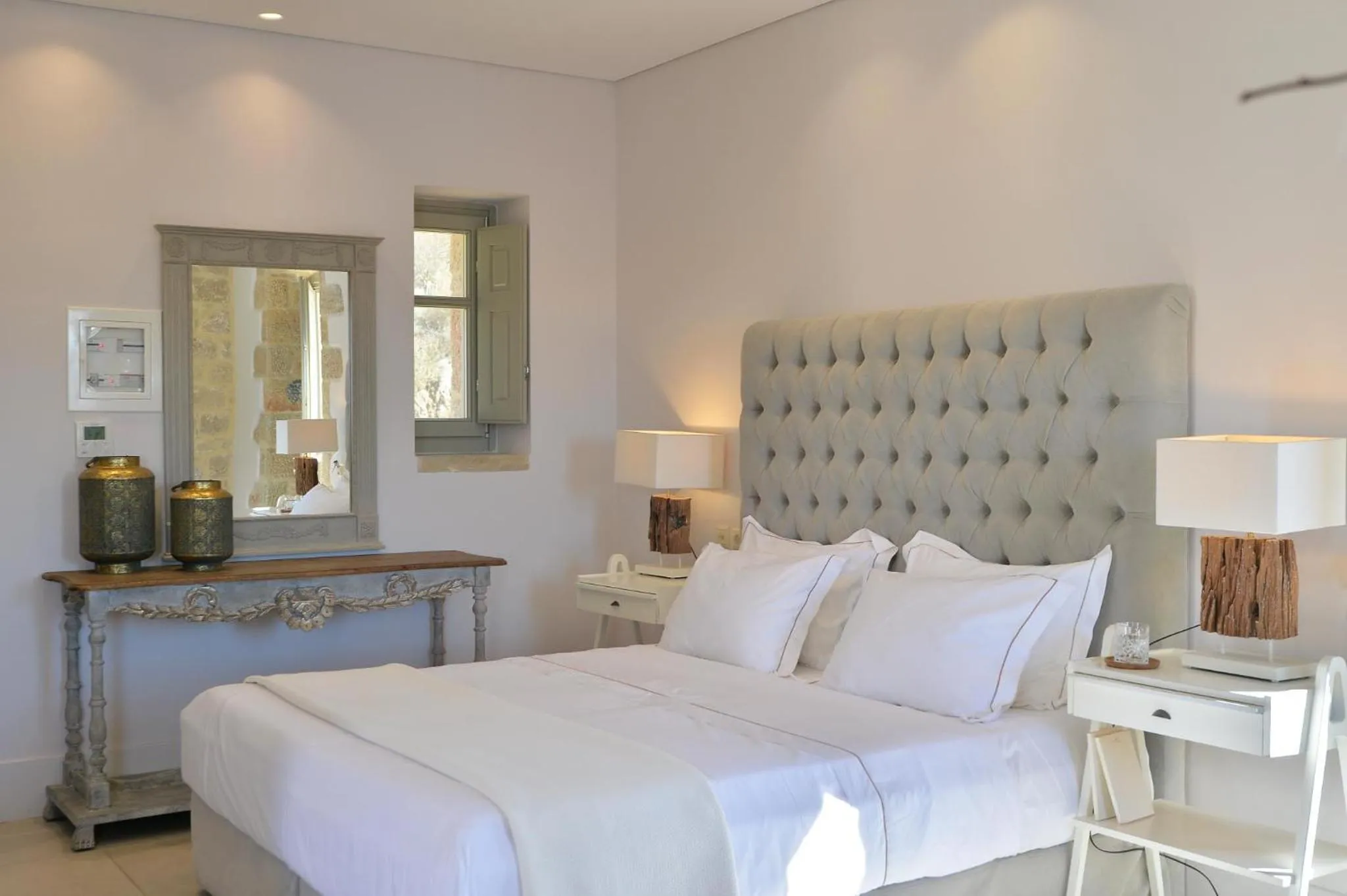 Photo of the whole room, Bed in Akrolithi Boutique Hotel & Suites