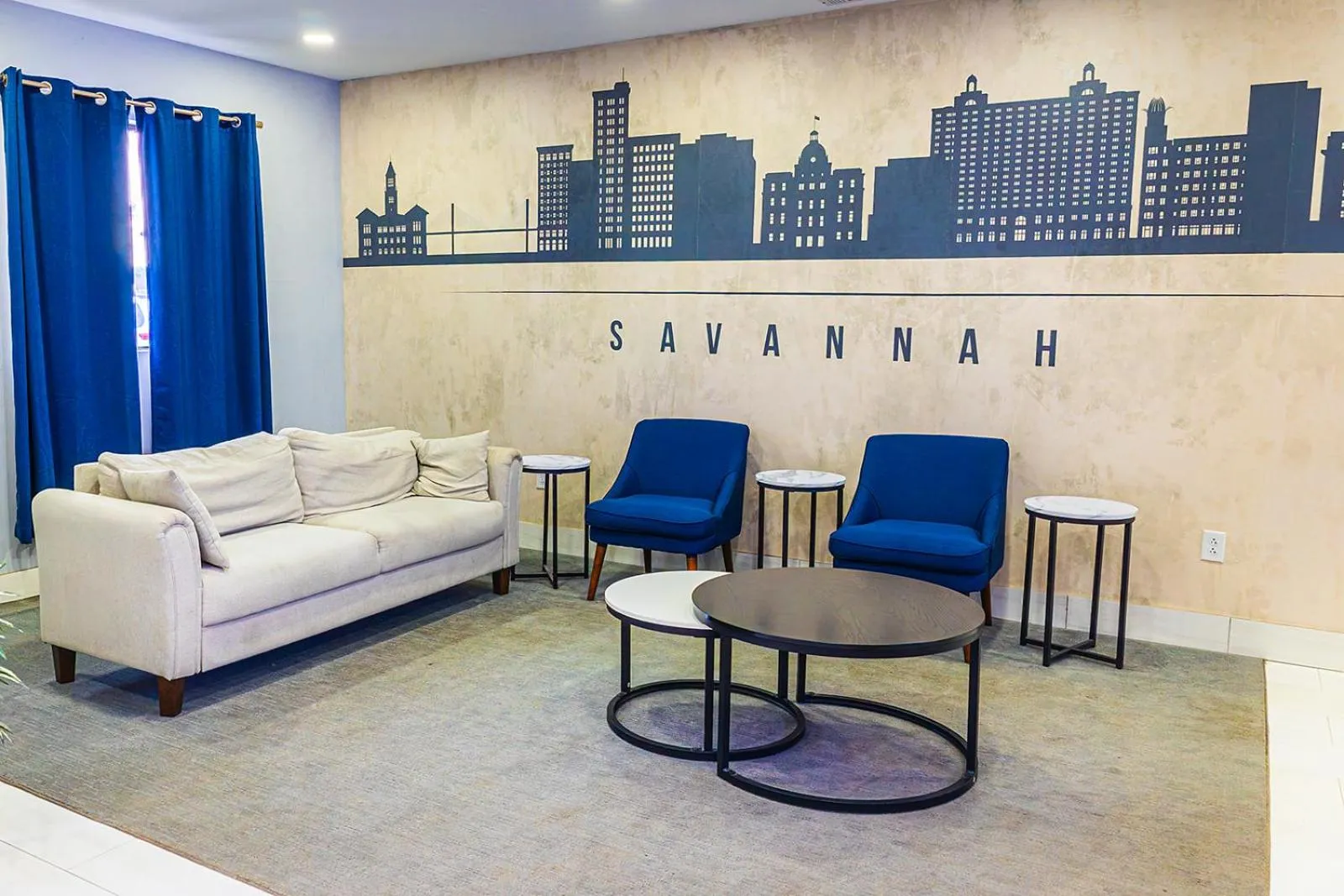 Living room in Baymont by Wyndham Port Wentworth