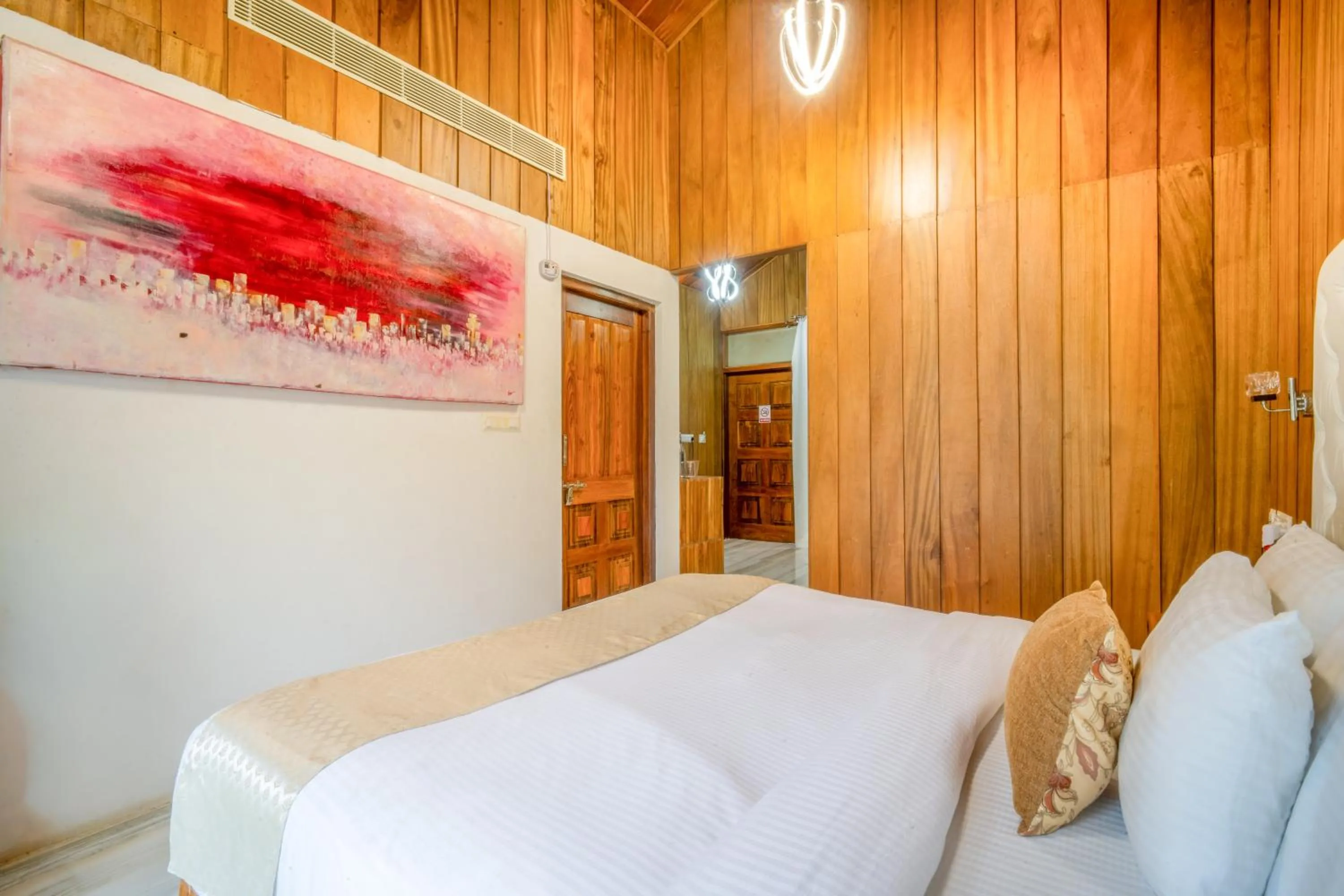 Bed in Rainforest Resort