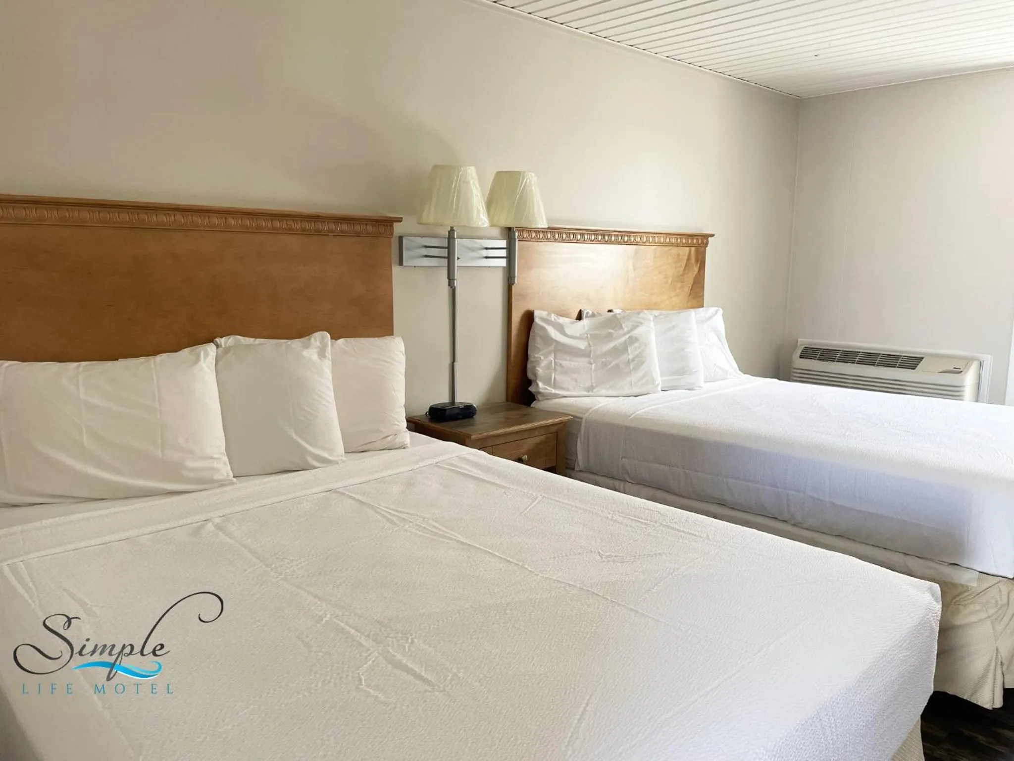 Bed in Simple Life Motel