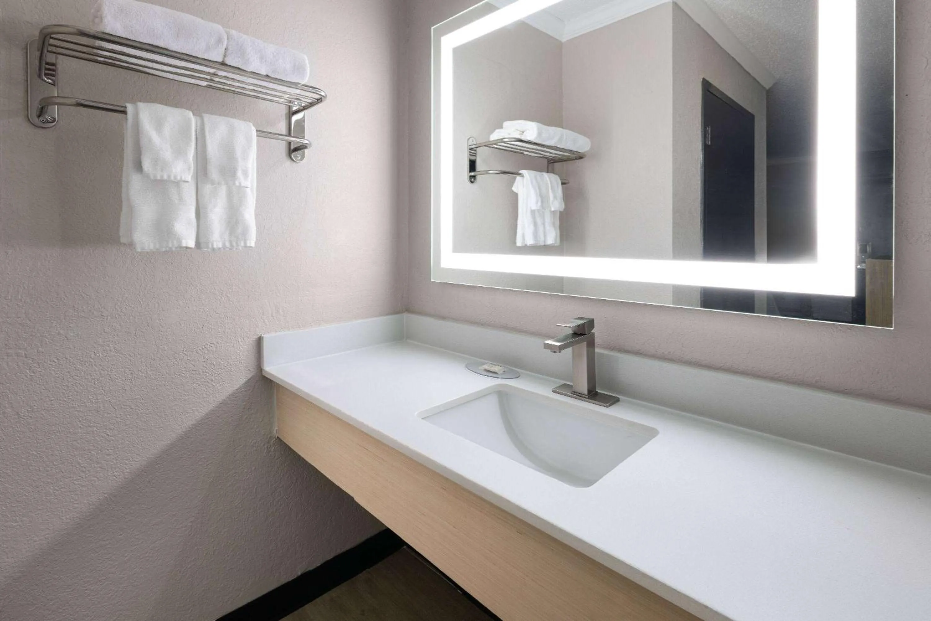 Bathroom in Days Inn by Wyndham Hinesville Near Fort Stewart, Newly Renovated, Free Hot Breakfast, Restaurant and Bar