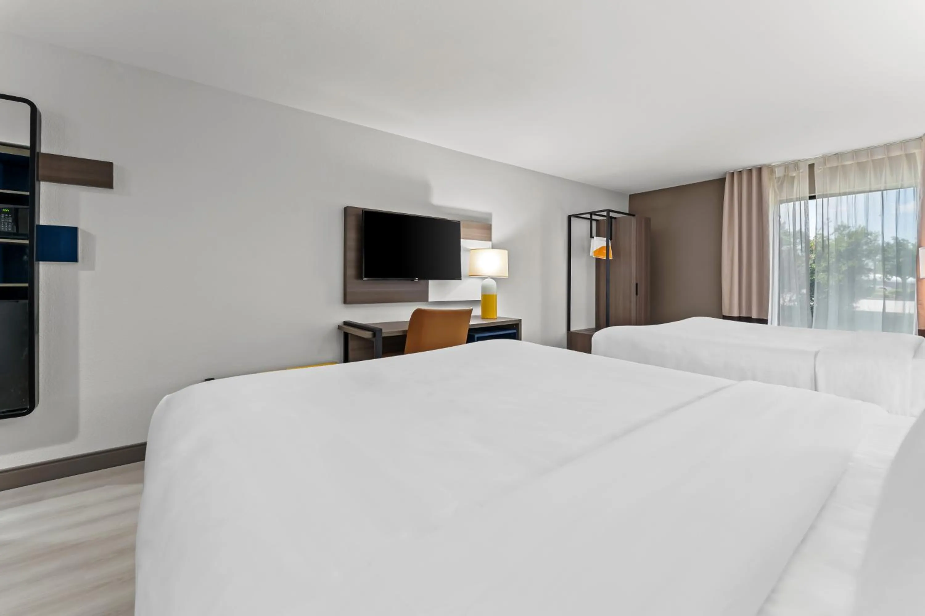 Bed in Comfort Inn & Suites Perry National Fairgrounds Area