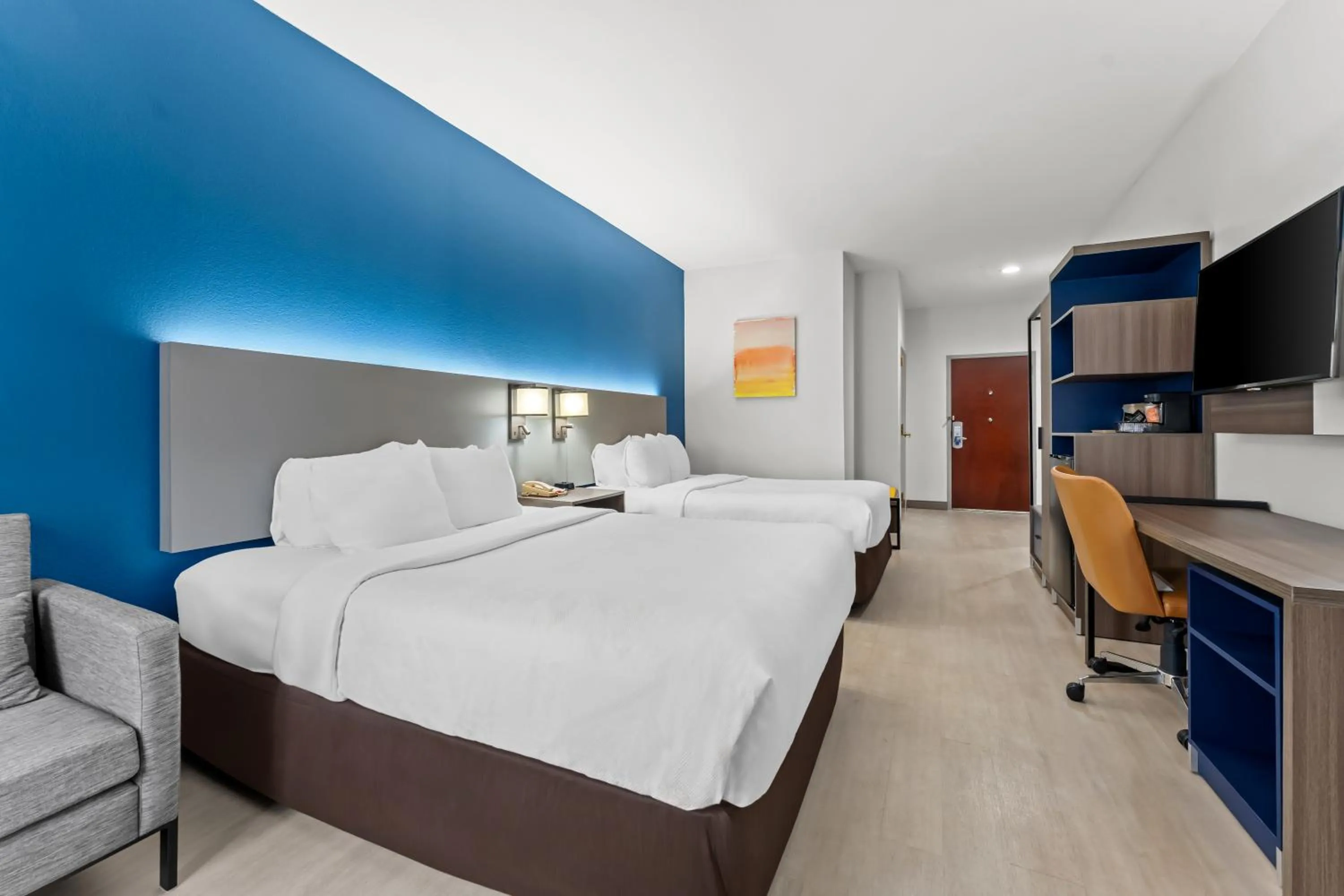 Bed in Comfort Inn & Suites Perry National Fairgrounds Area