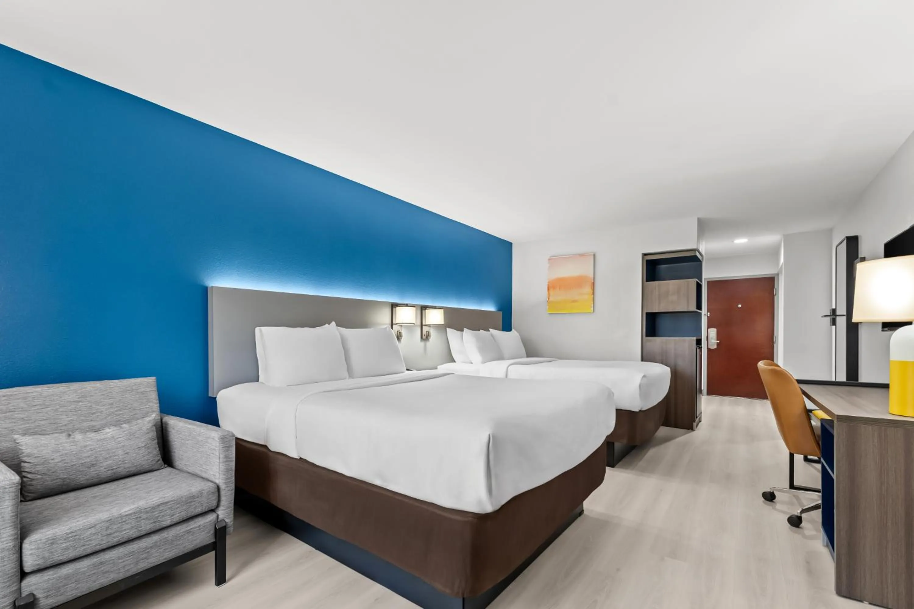 Bed in Comfort Inn & Suites Perry National Fairgrounds Area