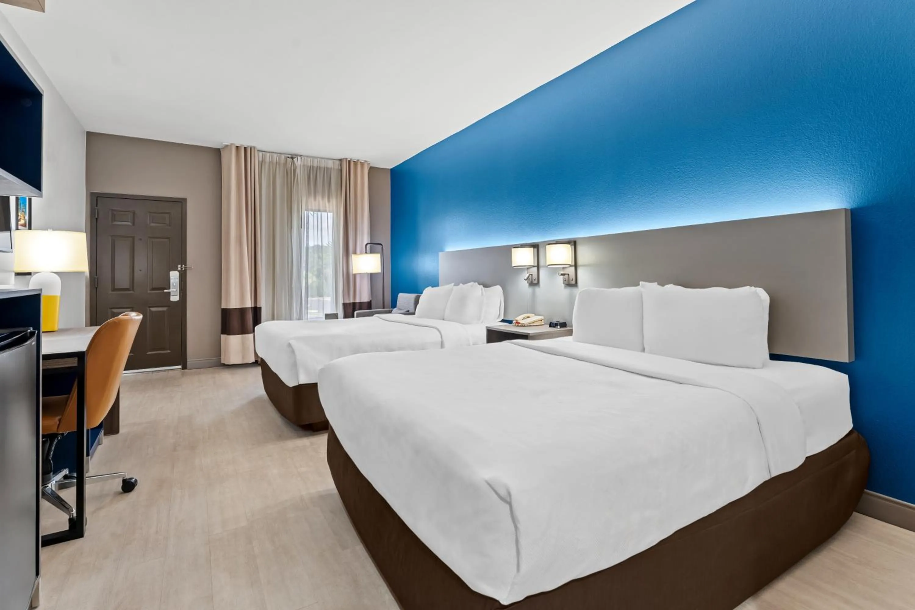 Bed in Comfort Inn & Suites Perry National Fairgrounds Area