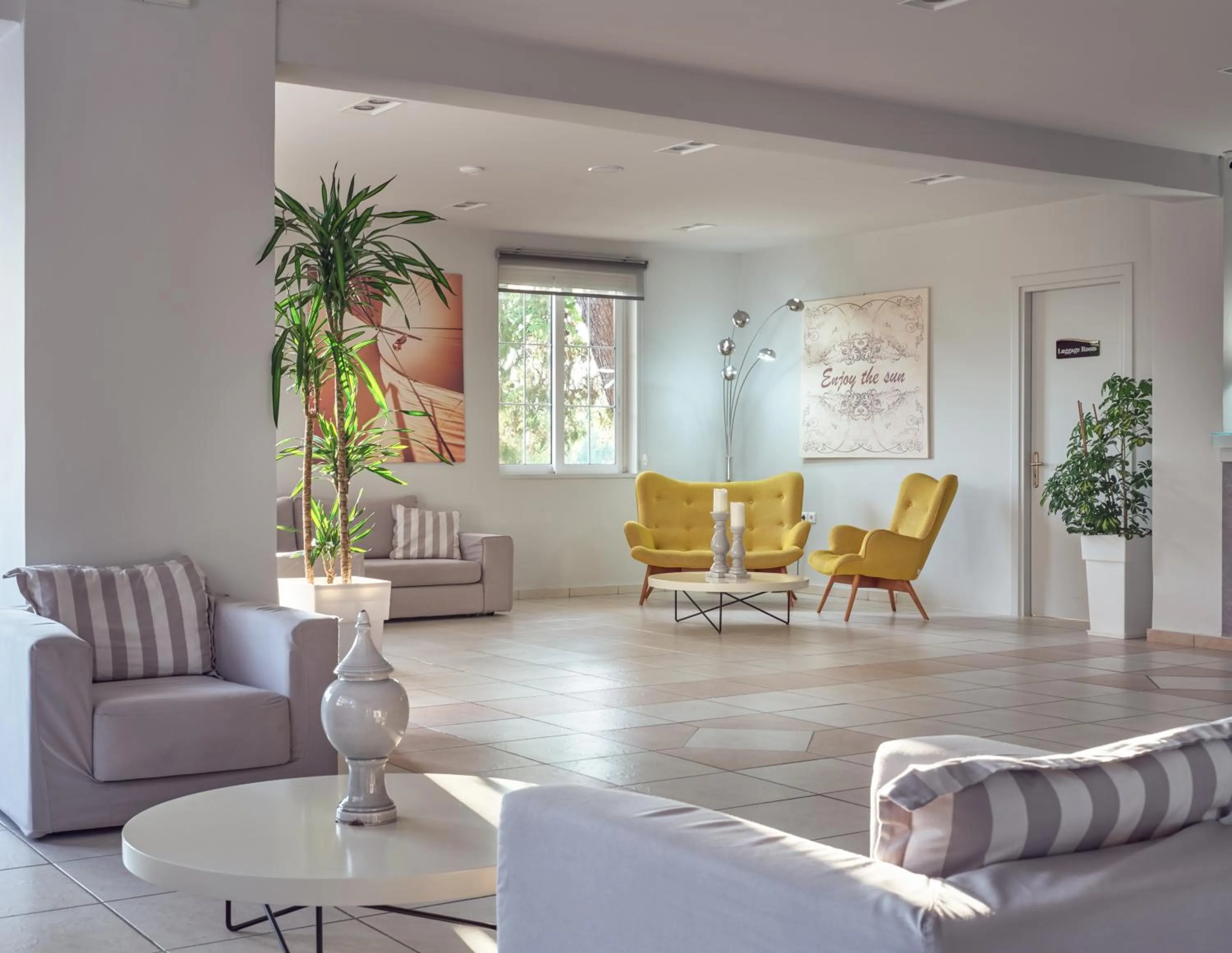 Lobby or reception in Koukounaria Hotel & Suites