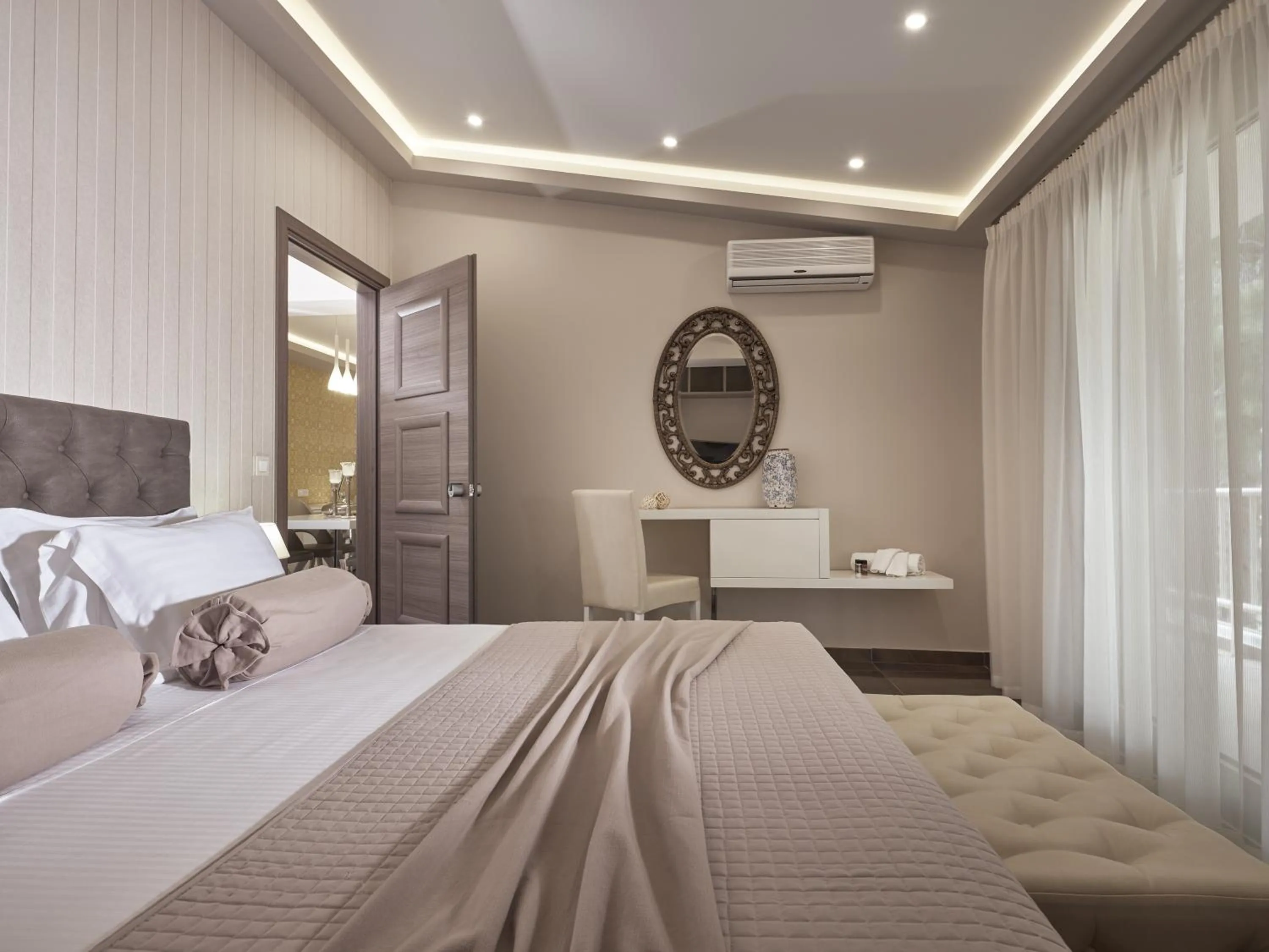 Bed in Koukounaria Hotel & Suites