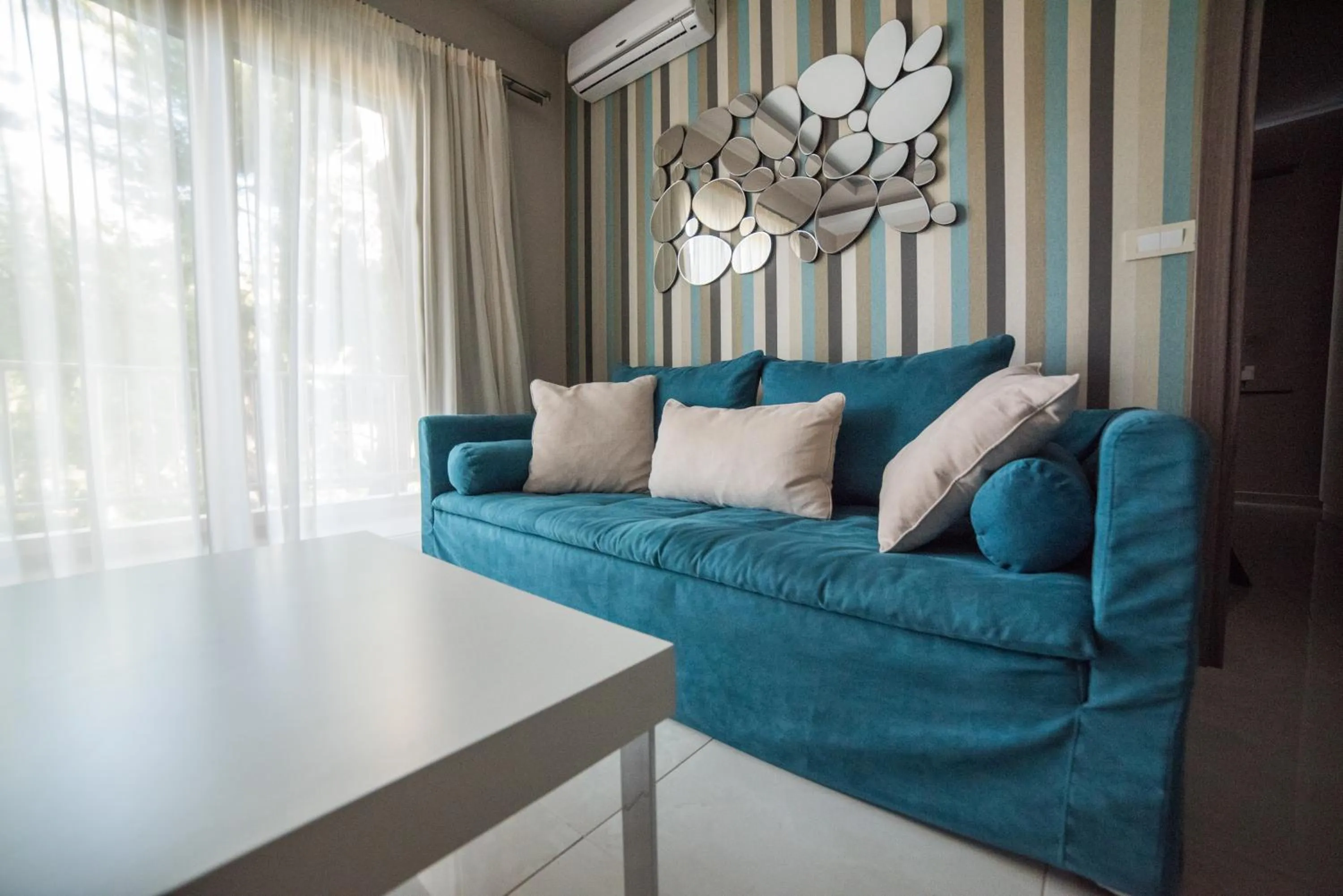 Living room in Koukounaria Hotel & Suites