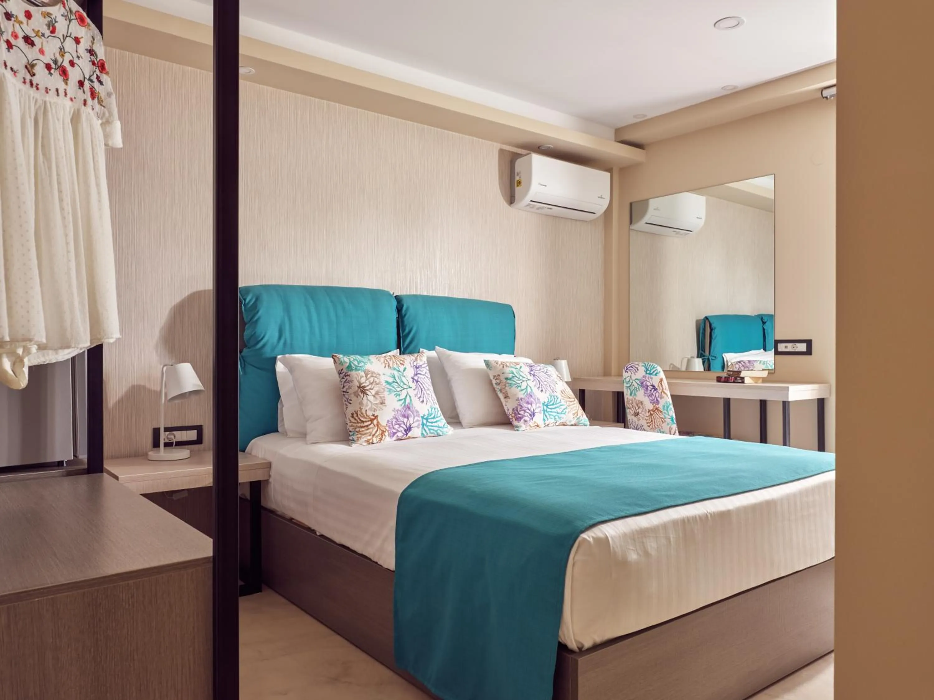 Bed in Koukounaria Hotel & Suites