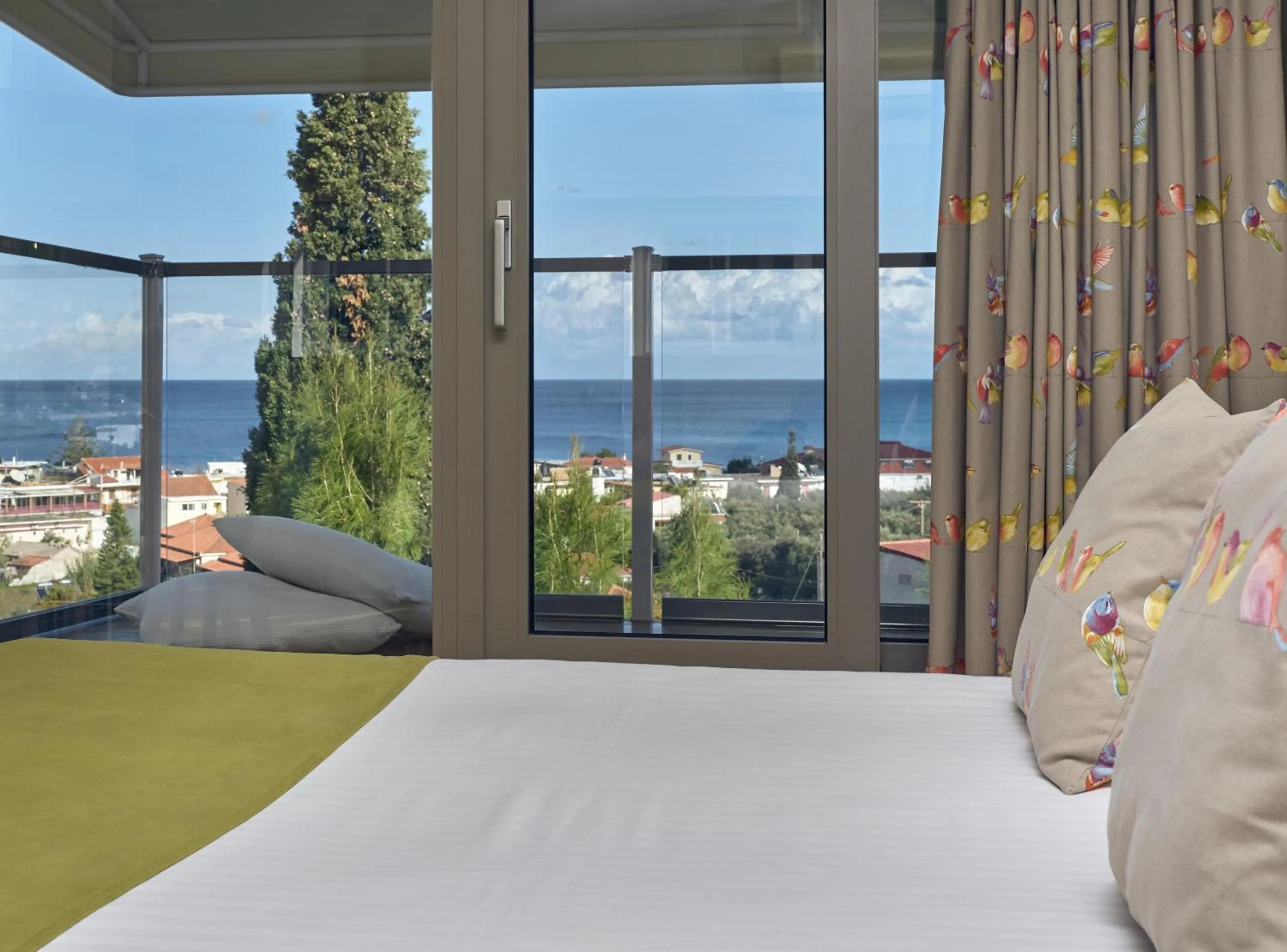 Bed in Koukounaria Hotel & Suites