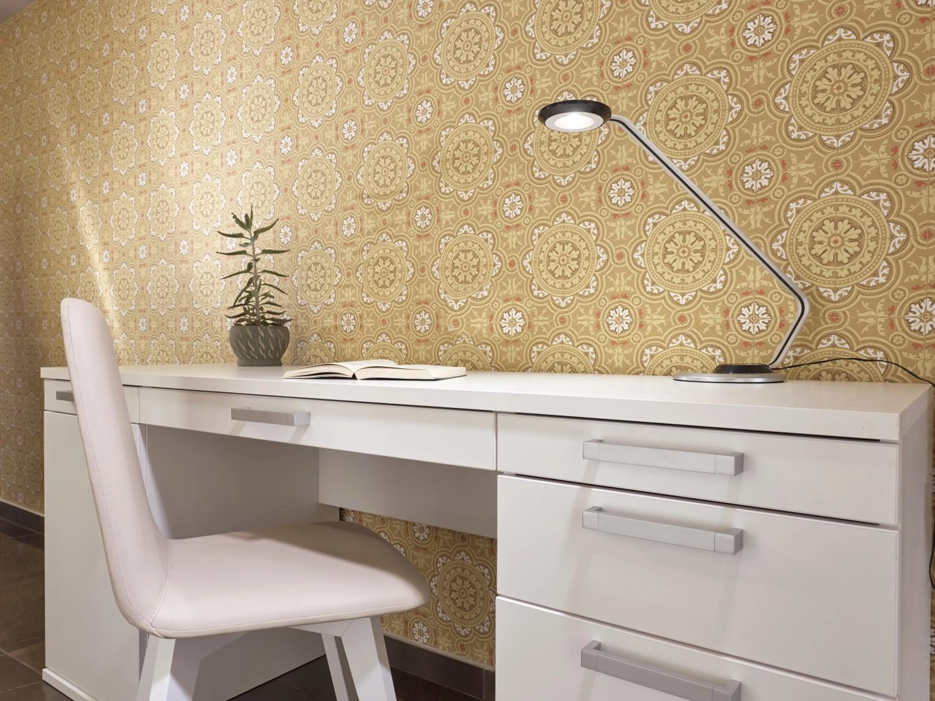 Bedroom in Koukounaria Hotel & Suites