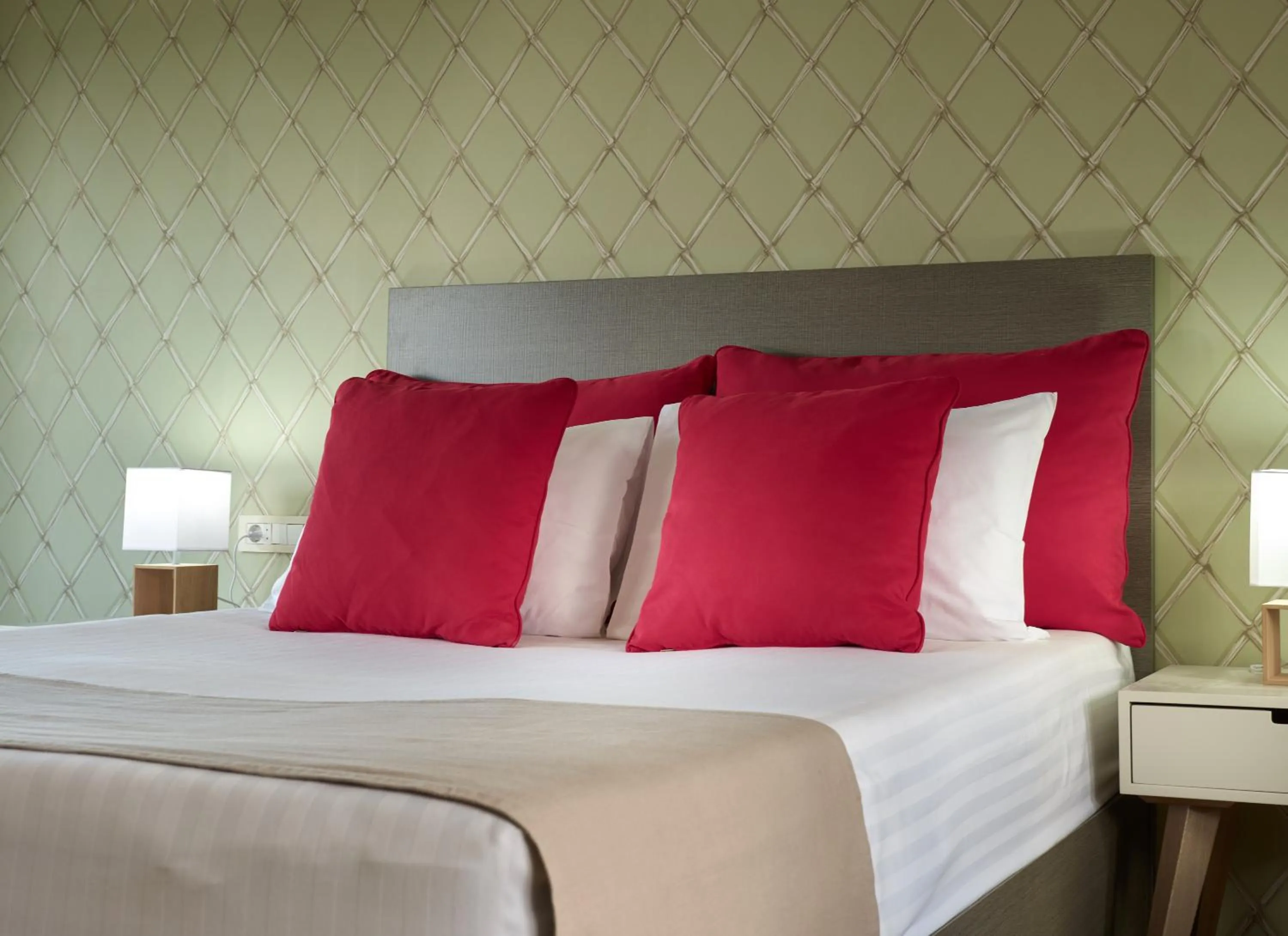 Bed in Koukounaria Hotel & Suites