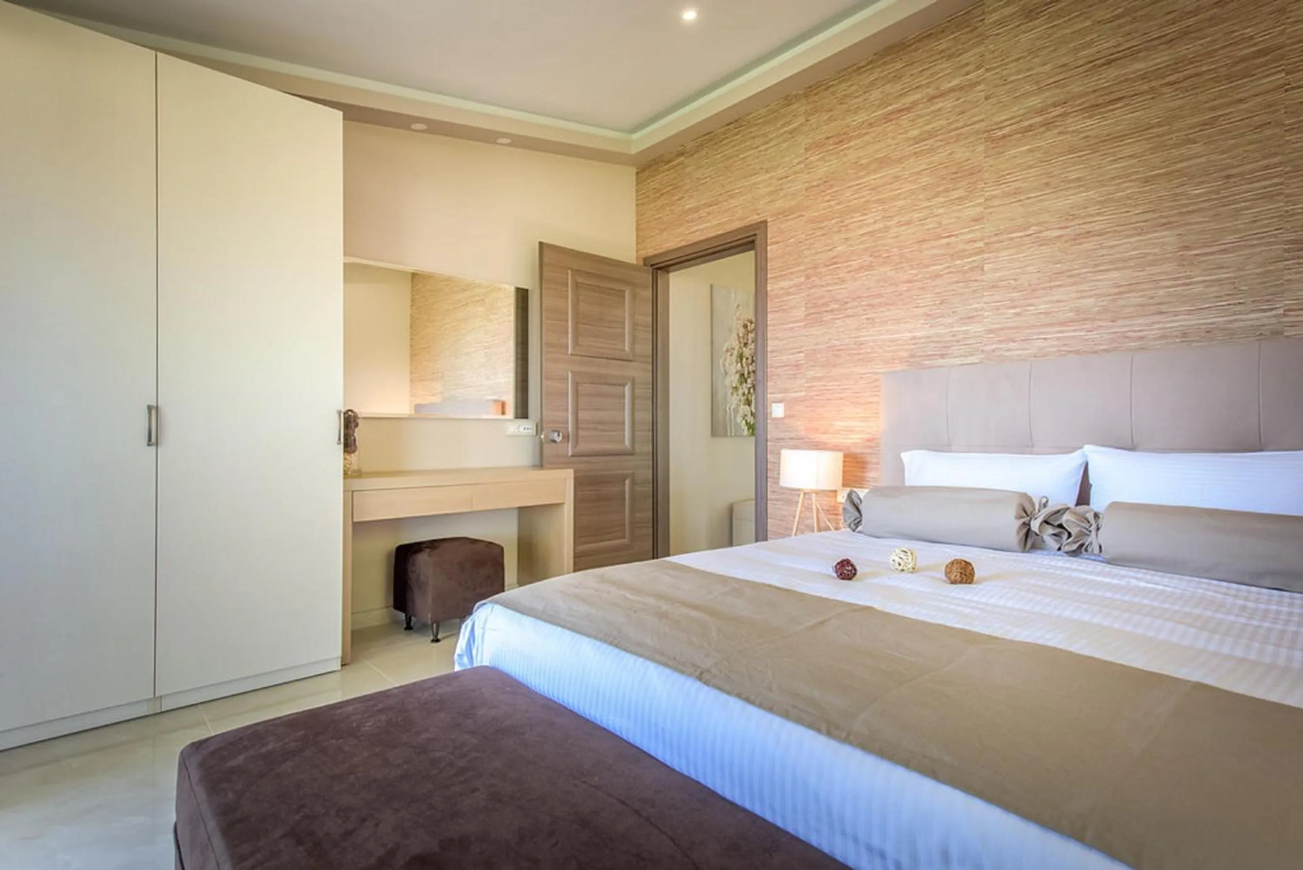 Photo of the whole room, Bed in Koukounaria Hotel & Suites