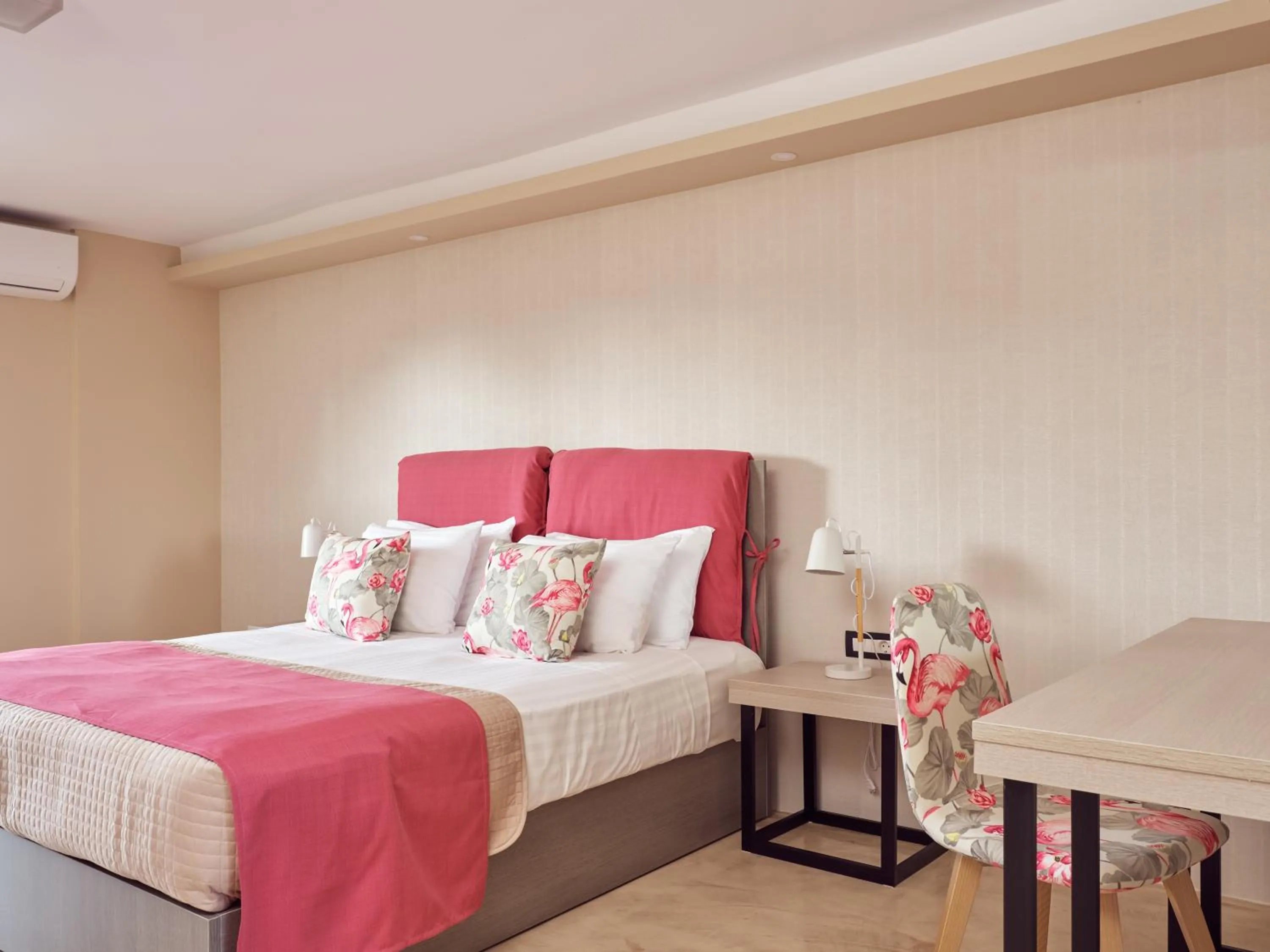 Bed in Koukounaria Hotel & Suites