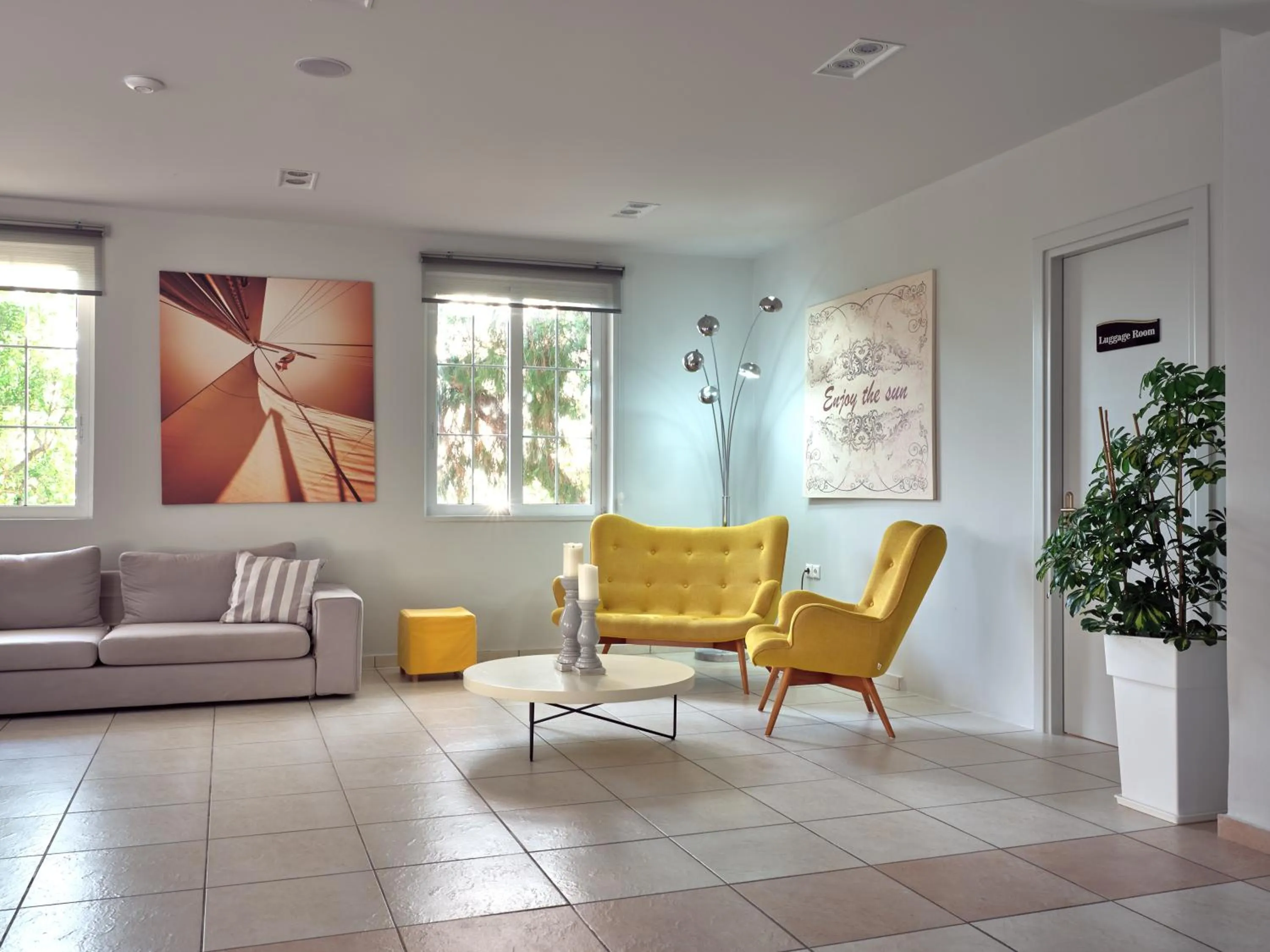 Lobby or reception in Koukounaria Hotel & Suites