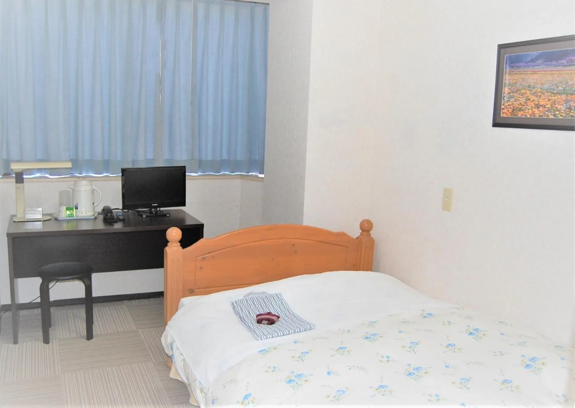 Bed in Ito Station Hotel