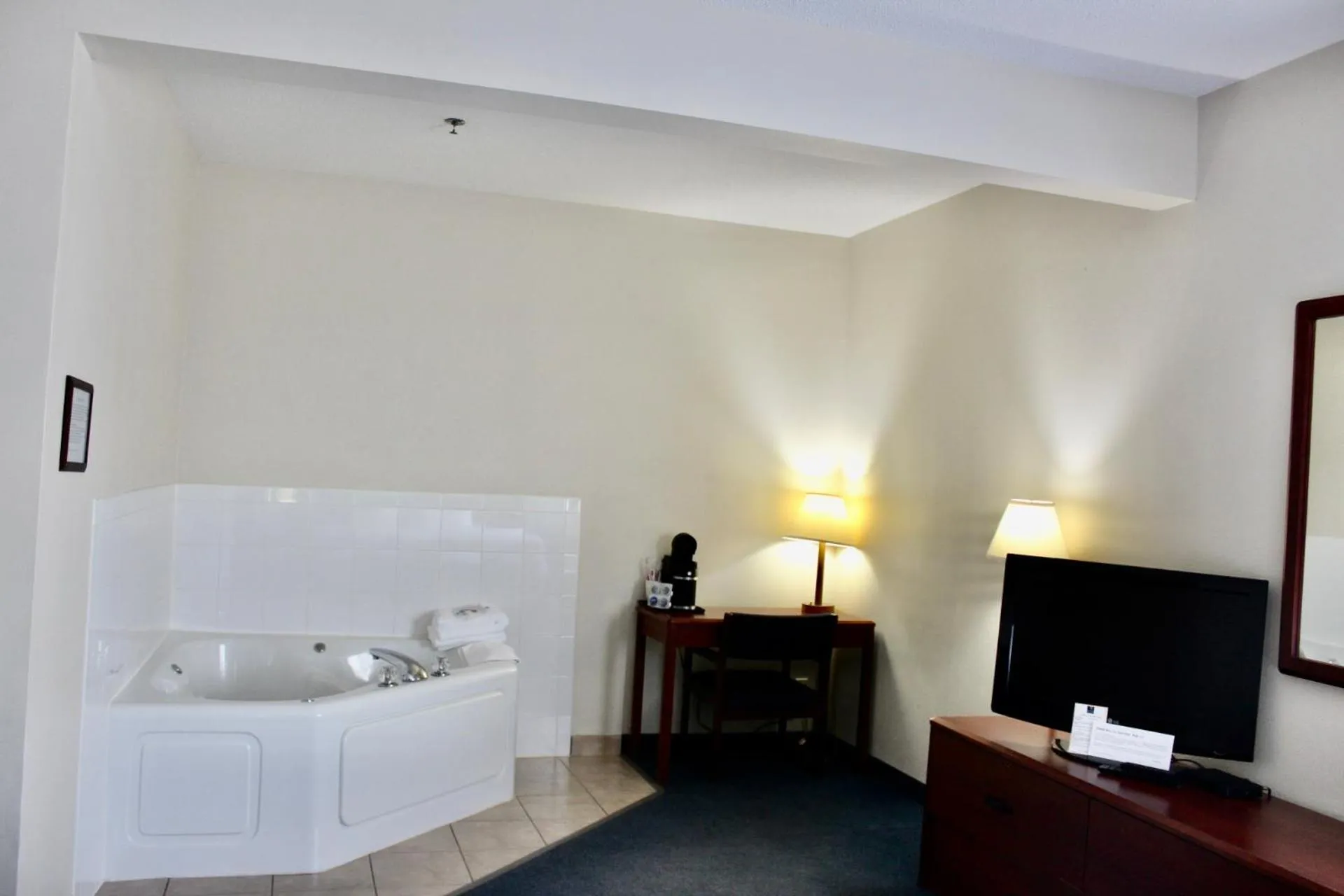 Bed in Reston Inn & Suites