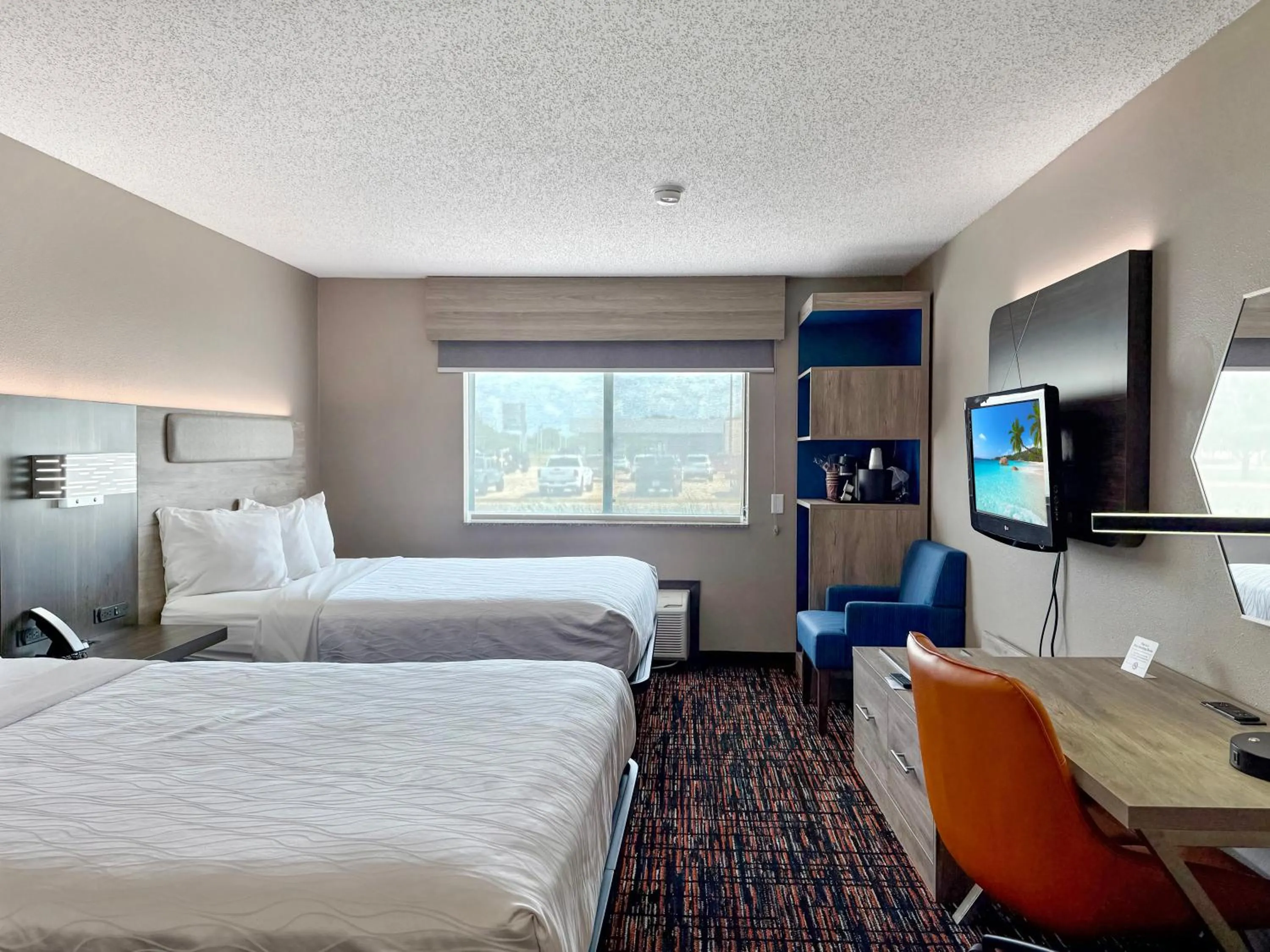 Bed in Reston Inn & Suites