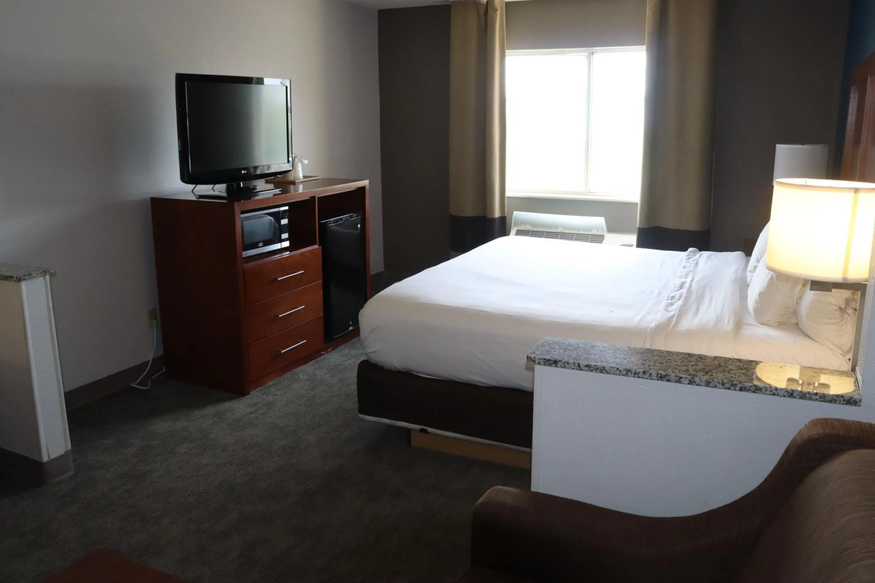 Photo of the whole room, Bed in Comfort Inn & Suites Coralville - Iowa City near Iowa River Landing