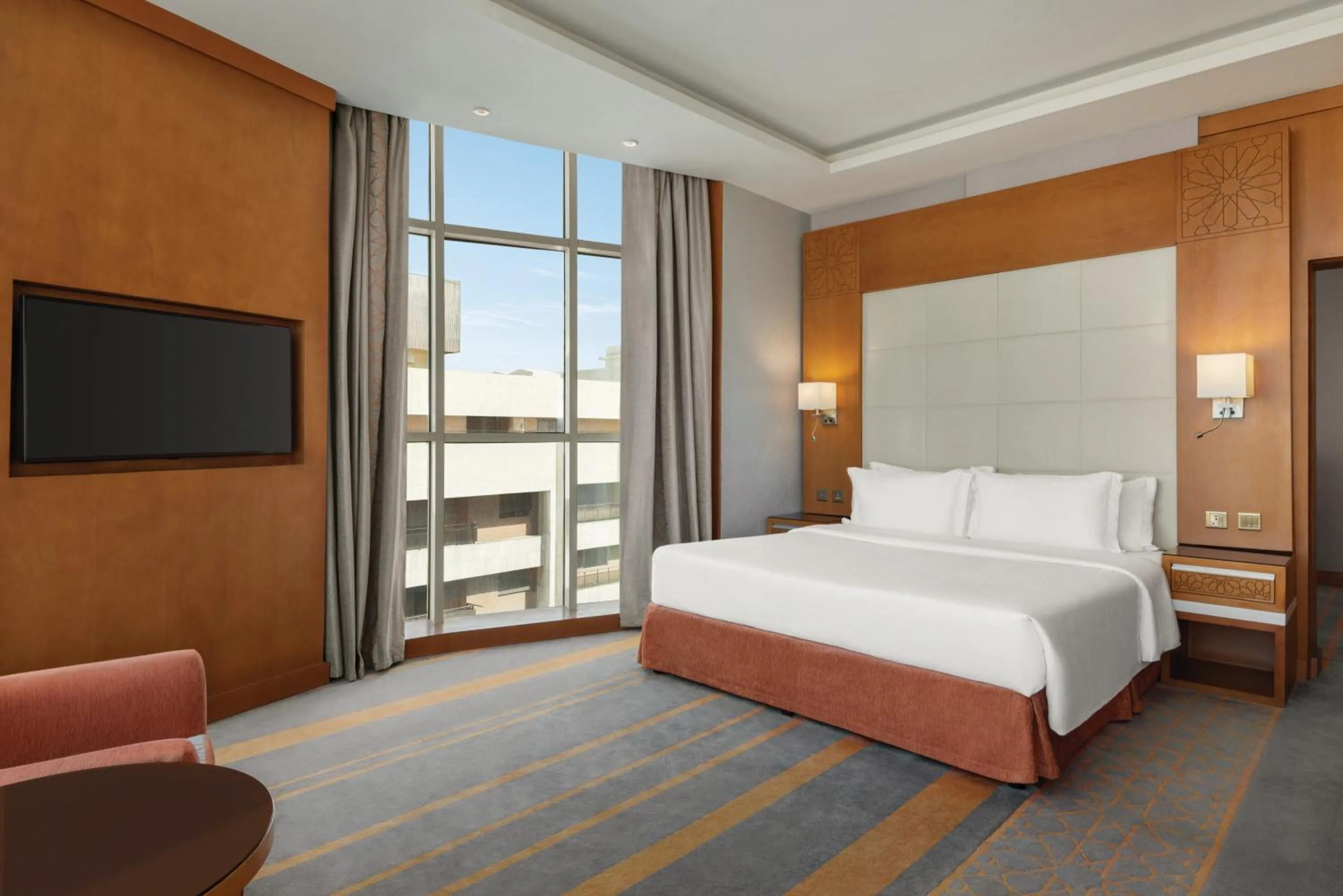 Bed in Vivid Jeddah Hotel, a member of Radisson Individuals