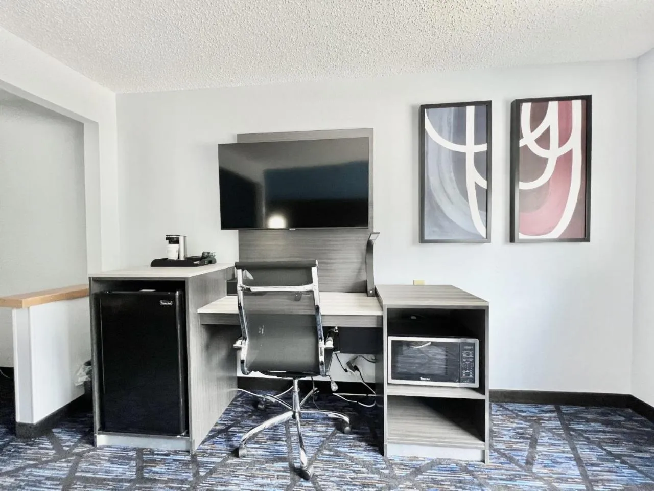 TV and multimedia in AmericInn by Wyndham Quincy