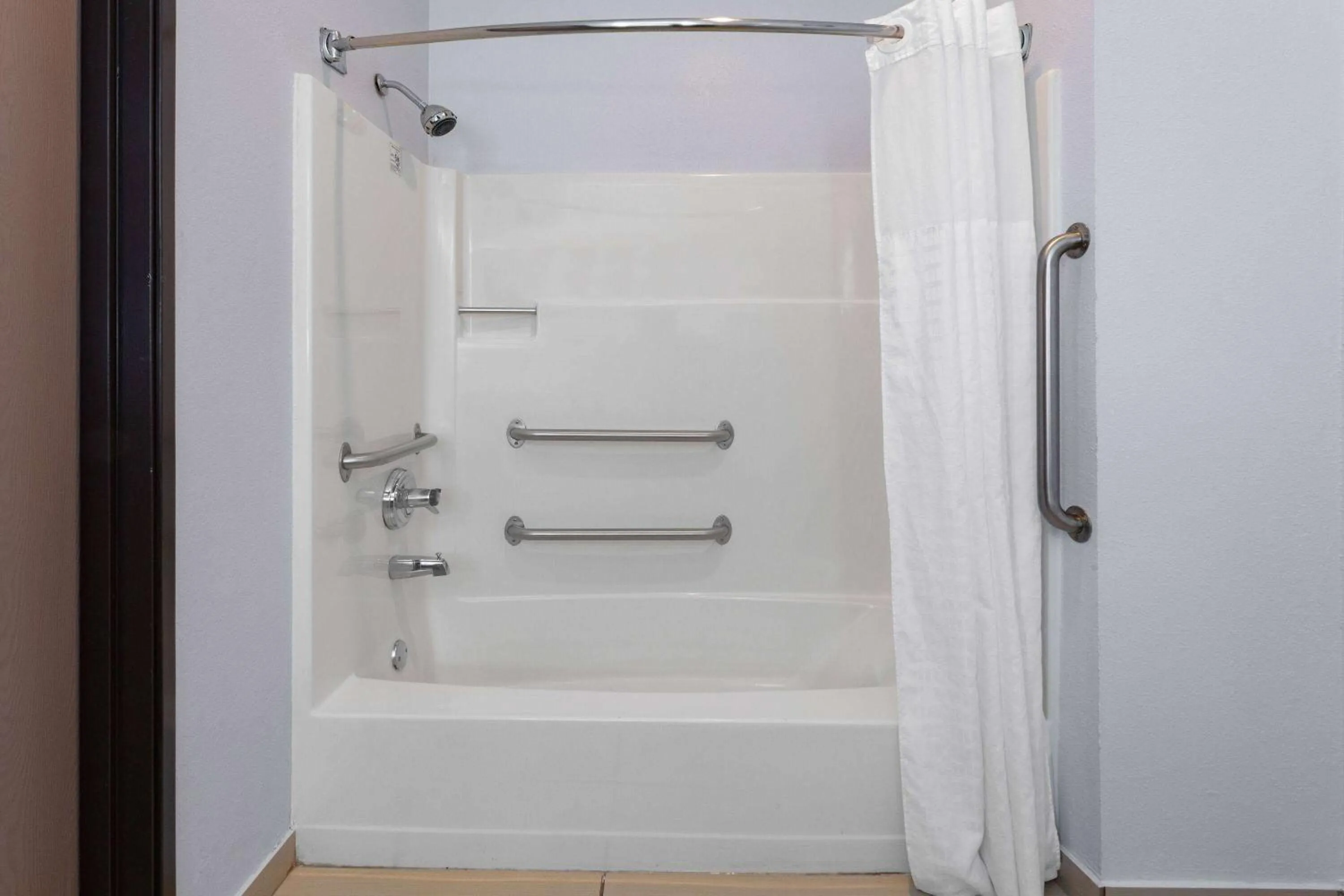 Bathroom in AmericInn by Wyndham Quincy