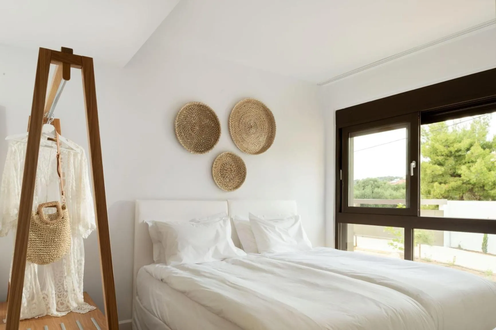 Bed in Amantes Villas and Suites