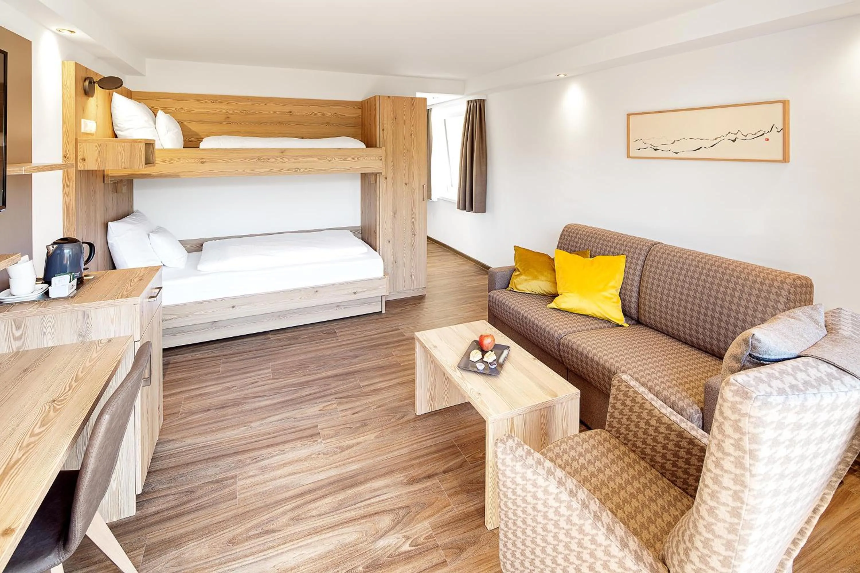 Living room, Bed in Hotel Kühberg